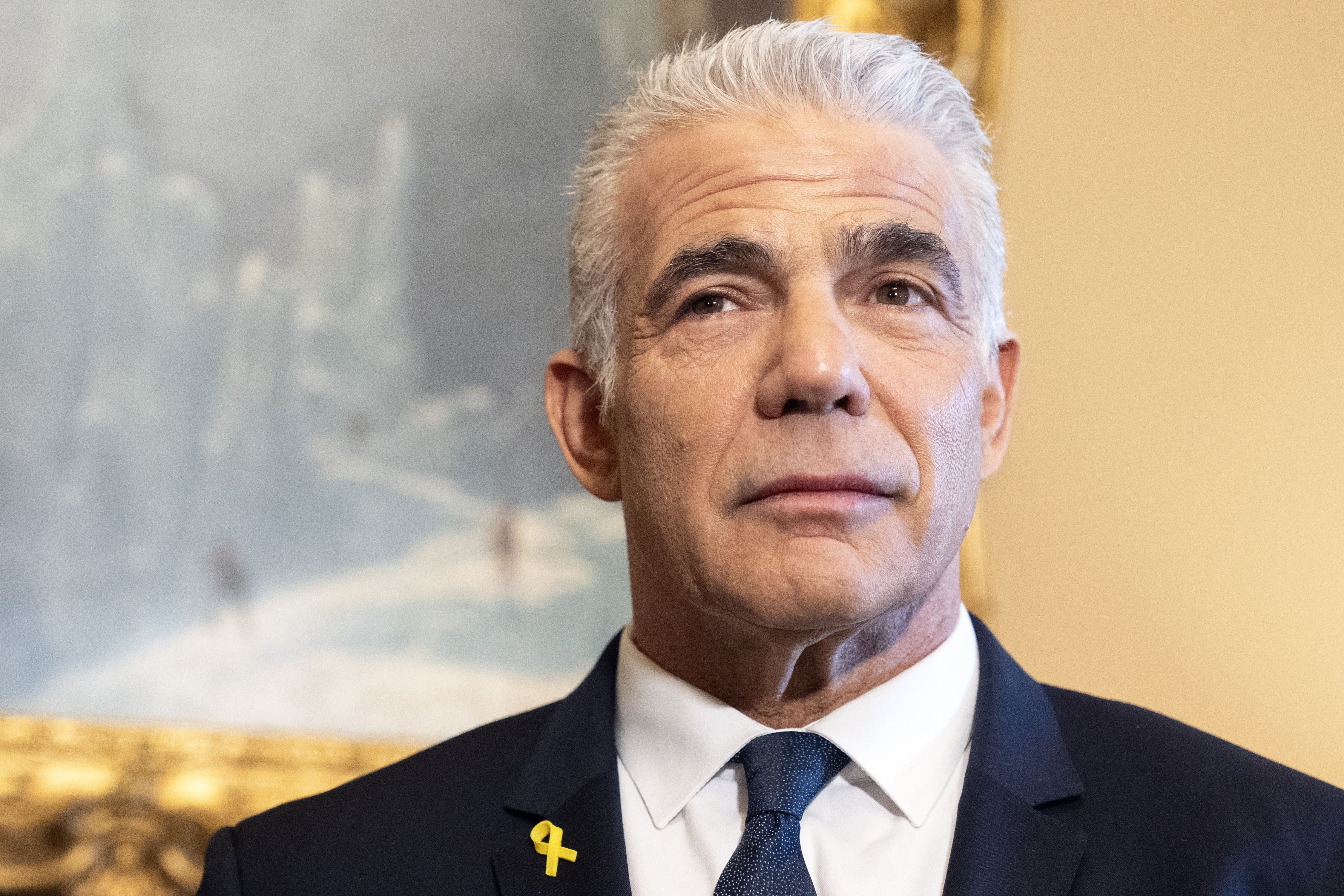 FILE - Israeli Opposition Leader Yair Lapid meets with Senate Majority Leader Chuck Schumer of N.Y., Tuesday, April 9, 2024, on Capitol Hill in Washington. (AP Photo/Jacquelyn Martin, file)
