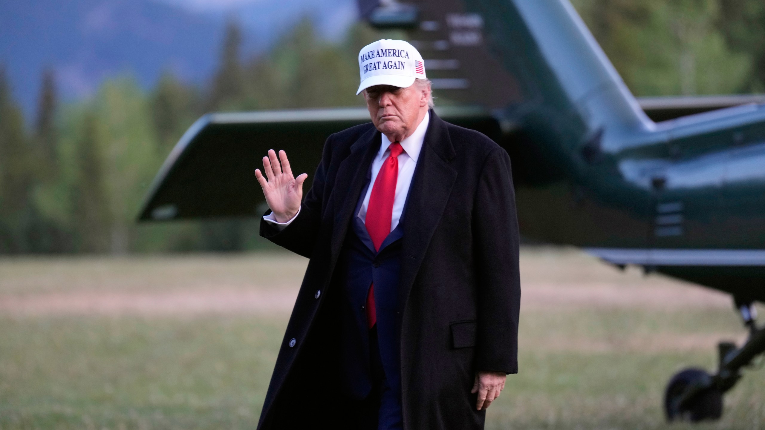 U.S. President Donald Trump arrives at the G7 Summit in Kananaskis, Alberta, Sunday, June 15, 2025. (Adrian Wyld/The Canadian Press via AP)