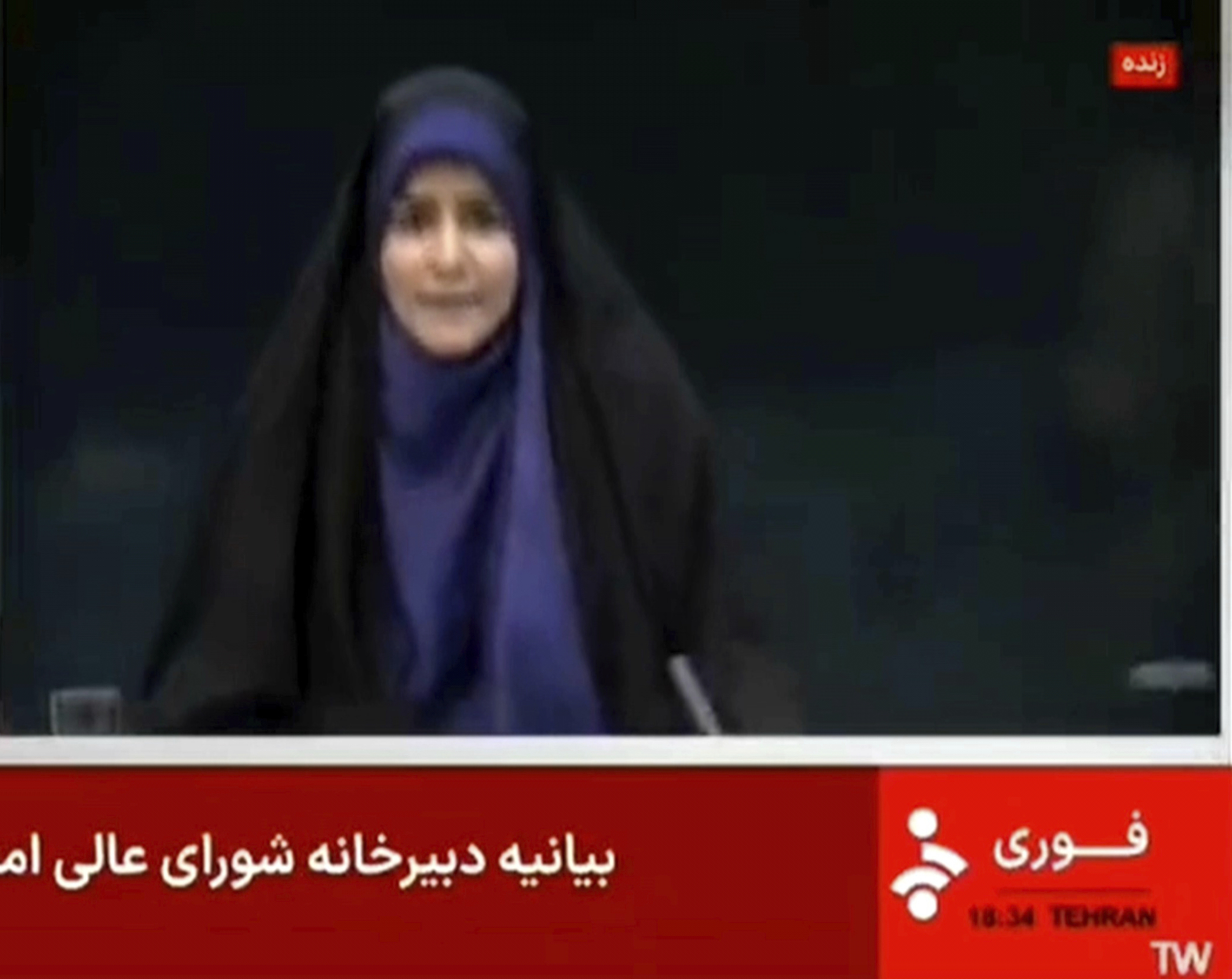 This frame grab from a video released by Iran state TV shows anchor Sahar Emami amid an explosion from an Israeli attack during a live TV broadcast, June 16, 2025, in Tehran, Iran. (Iran state TV, IRINN via AP)