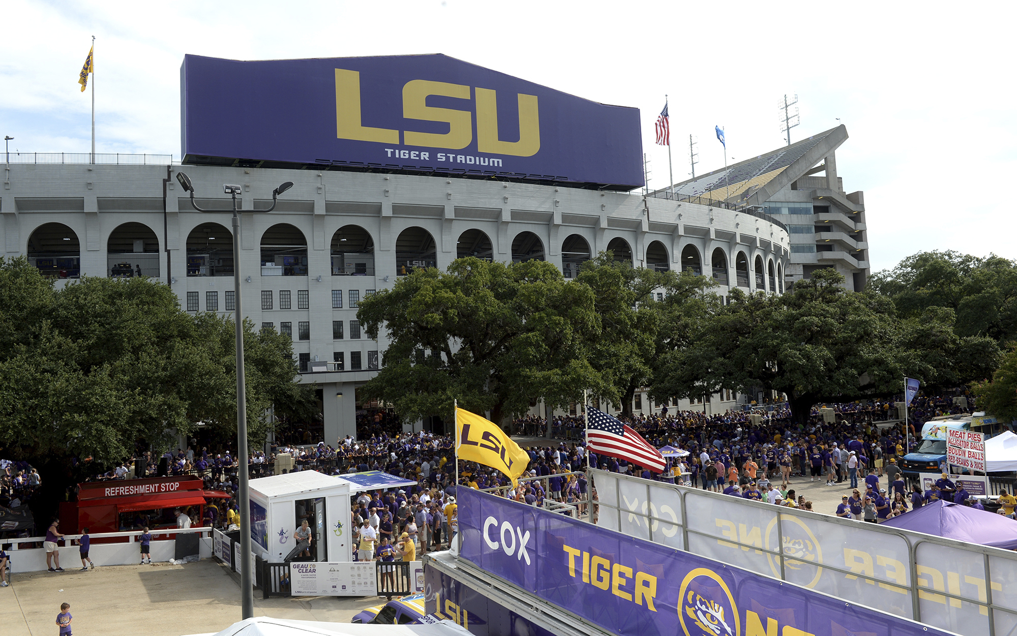 FILE - Preparations are made outside Tiger Stadium before an NCAA football game between LSU and Northwestern State in Baton Rouge, La, Sept. 14, 2019. (AP Photo/Patrick Dennis, File)