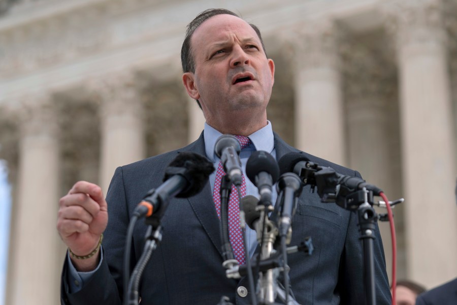 FILE - South Carolina Attorney General Alan Wilson talks to reporters outside of the Supreme Court, Dec. 4, 2024, in Washington. (AP Photo/Jose Luis Magana, File)