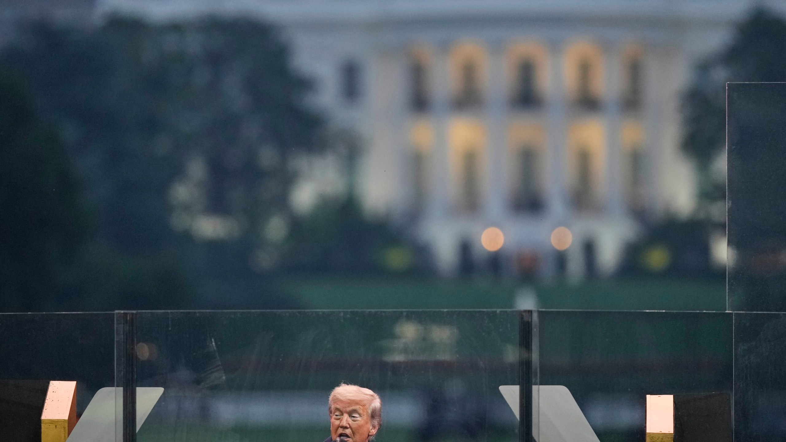 President Donald Trump speaks at a military parade commemorating the Army's 250th anniversary Saturday, June 14, 2025, in Washington. (AP Photo/Julia Demaree Nikhinson)