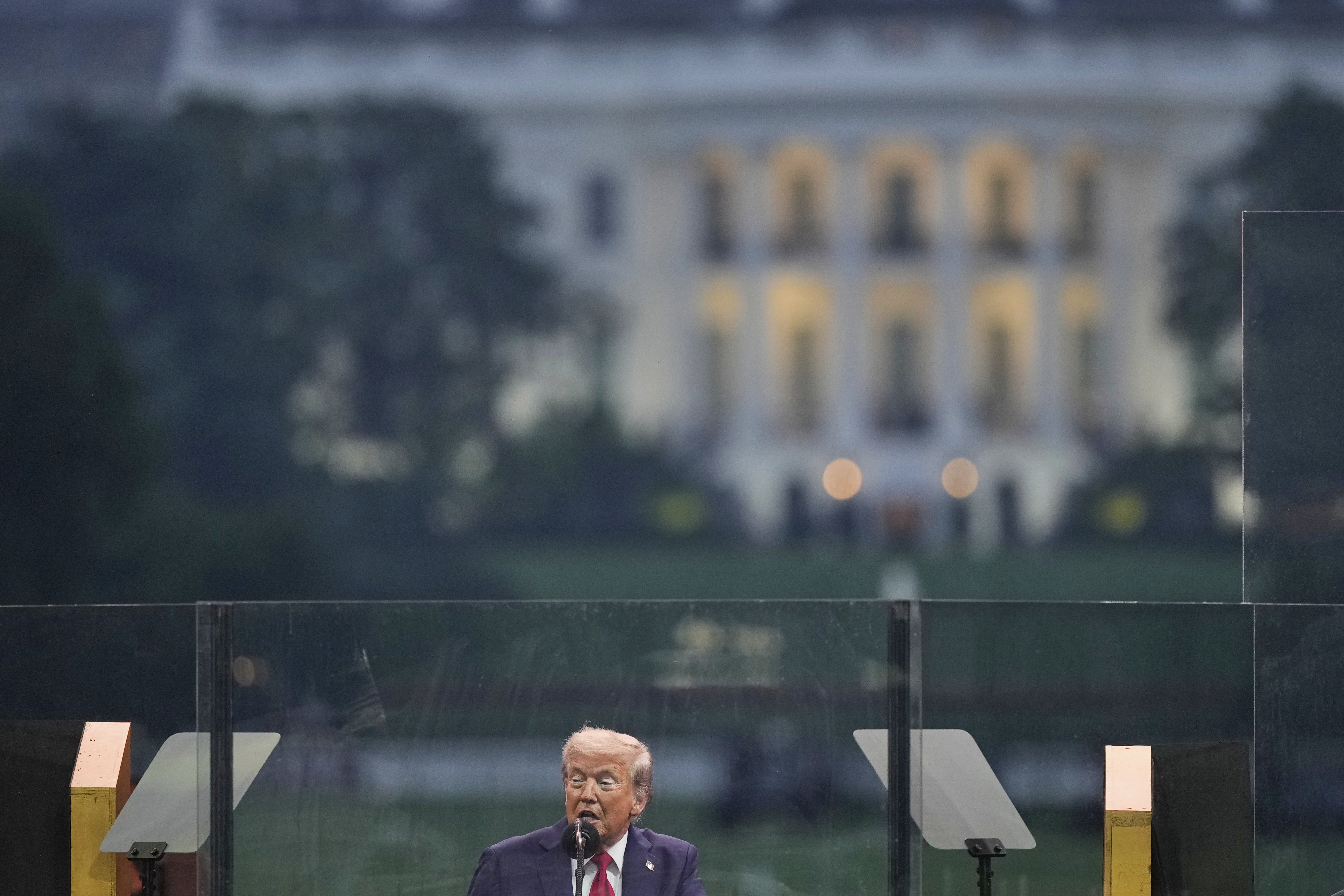 President Donald Trump speaks at a military parade commemorating the Army's 250th anniversary Saturday, June 14, 2025, in Washington. (AP Photo/Julia Demaree Nikhinson)