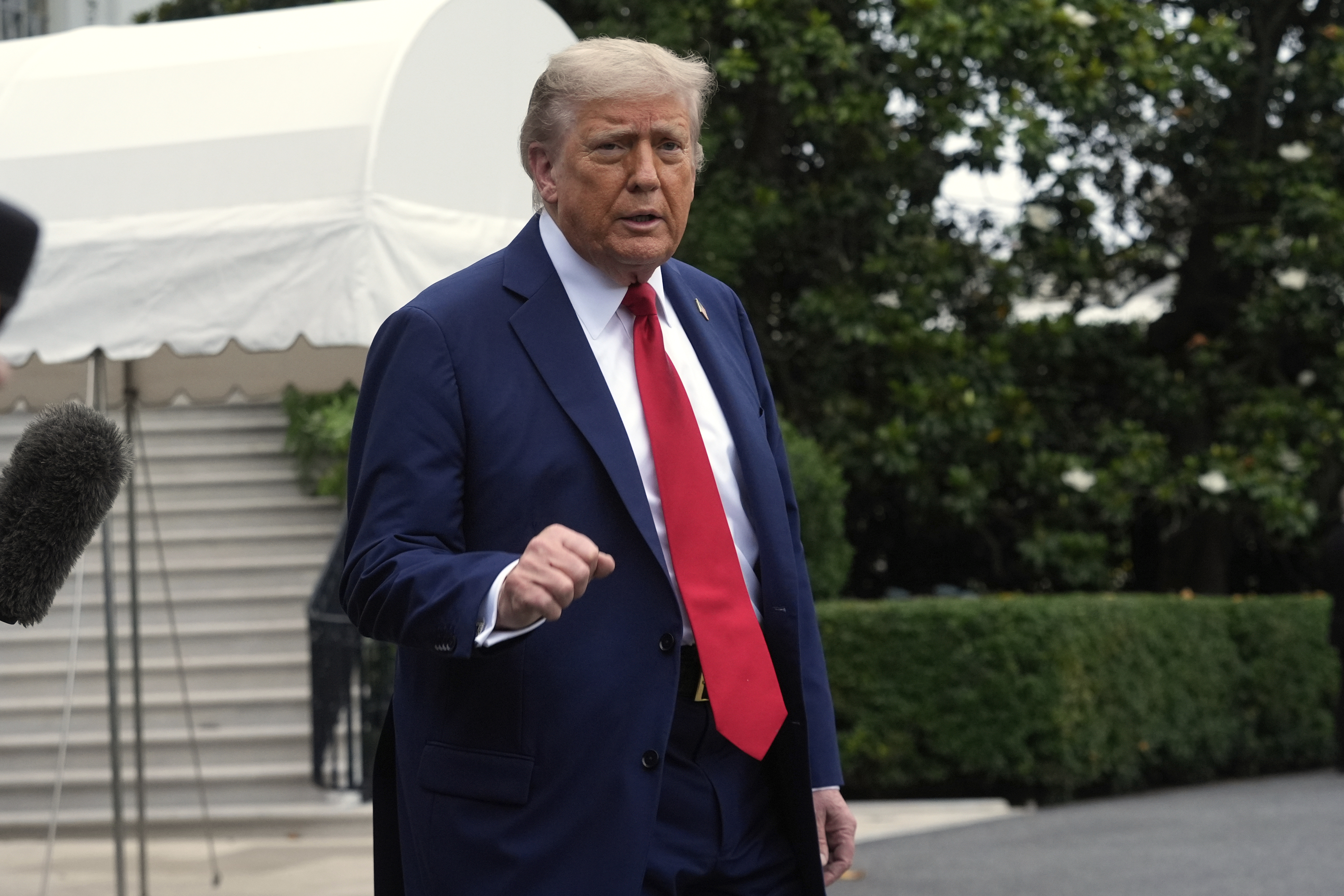 President Donald Trump walks to board Marine One after speakiing with reporters to depart the White House on his way to attend the G7 Summit in Canada, Sunday, June 15, 2025, in Washington. (AP Photo/Manuel Balce Ceneta)