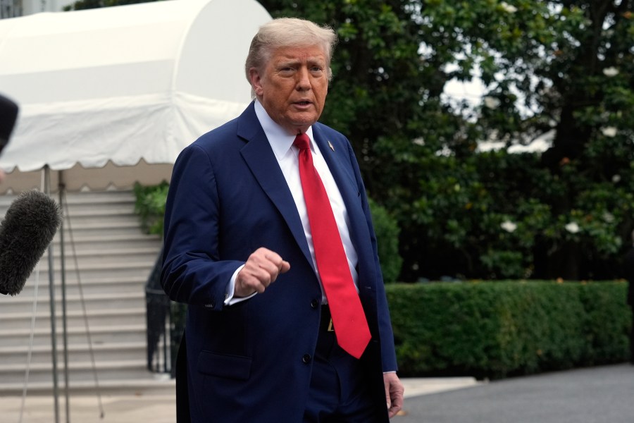 President Donald Trump walks to board Marine One after speakiing with reporters to depart the White House on his way to attend the G7 Summit in Canada, Sunday, June 15, 2025, in Washington. (AP Photo/Manuel Balce Ceneta)