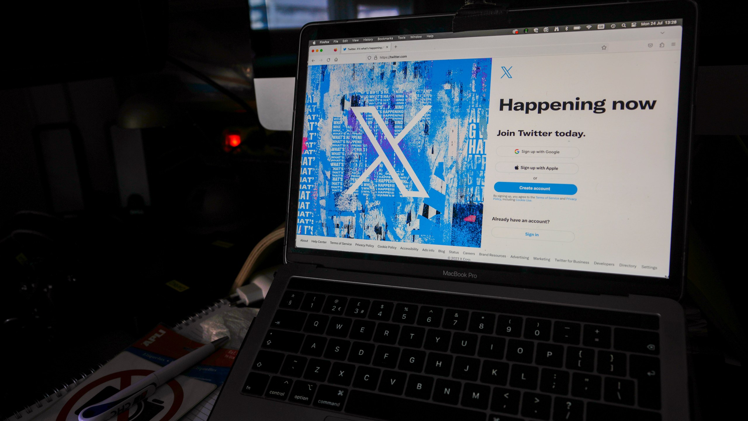 FILE - A view of a laptop shows an X sign-in page and logo, in Belgrade, Serbia, July 24, 2023. (AP Photo/Darko Vojinovic, File)