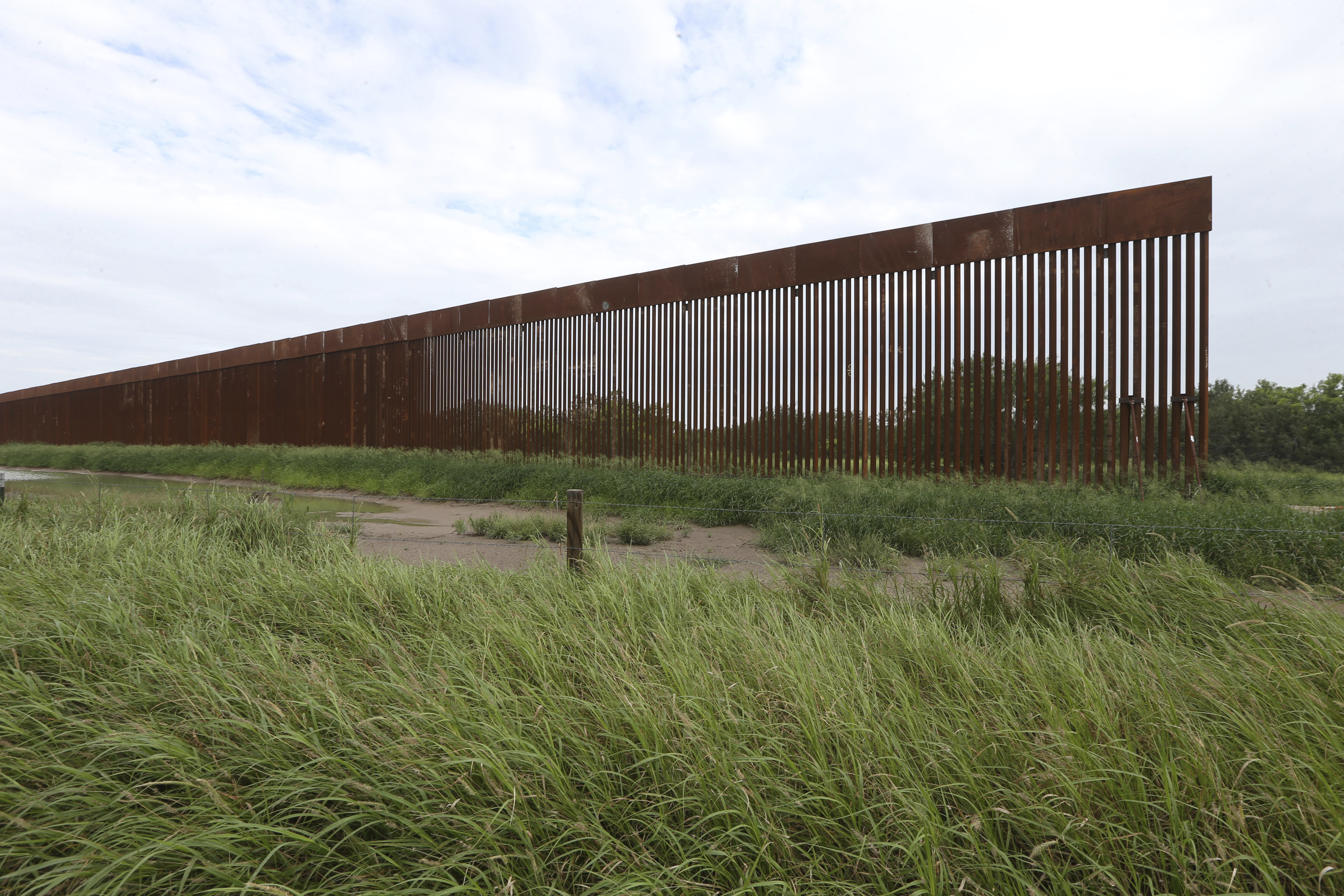 FILE - A border wall section stands on July 14, 2021, near La Grulla, Texas, in Starr County. (Delcia Lopez/The Monitor via AP, File)