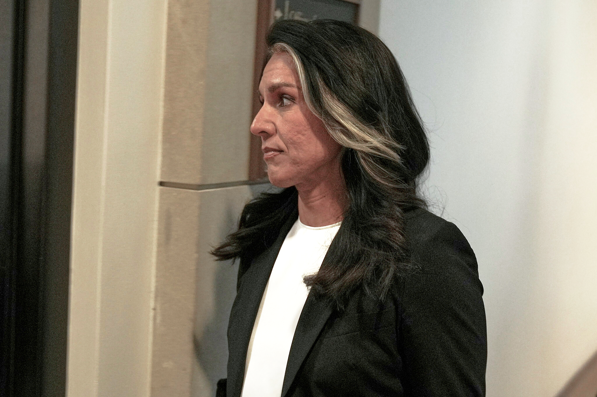 Director of National Intelligence Tulsi Gabbard leaves U.S. Capitol after a Senate Appropriations Subcommittee hearing on Monday, June. 16, 2025, in Washington. (AP Photo/Mariam Zuhaib)