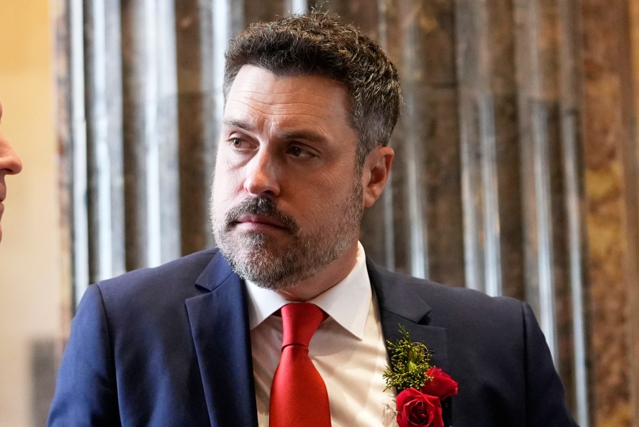 FILE - Republican state senator Blake Miguez converses before the swearing in of the Louisiana state legislature in Baton Rouge, La., on Jan. 8, 2024. (AP Photo/Gerald Herbert, Pool, File)