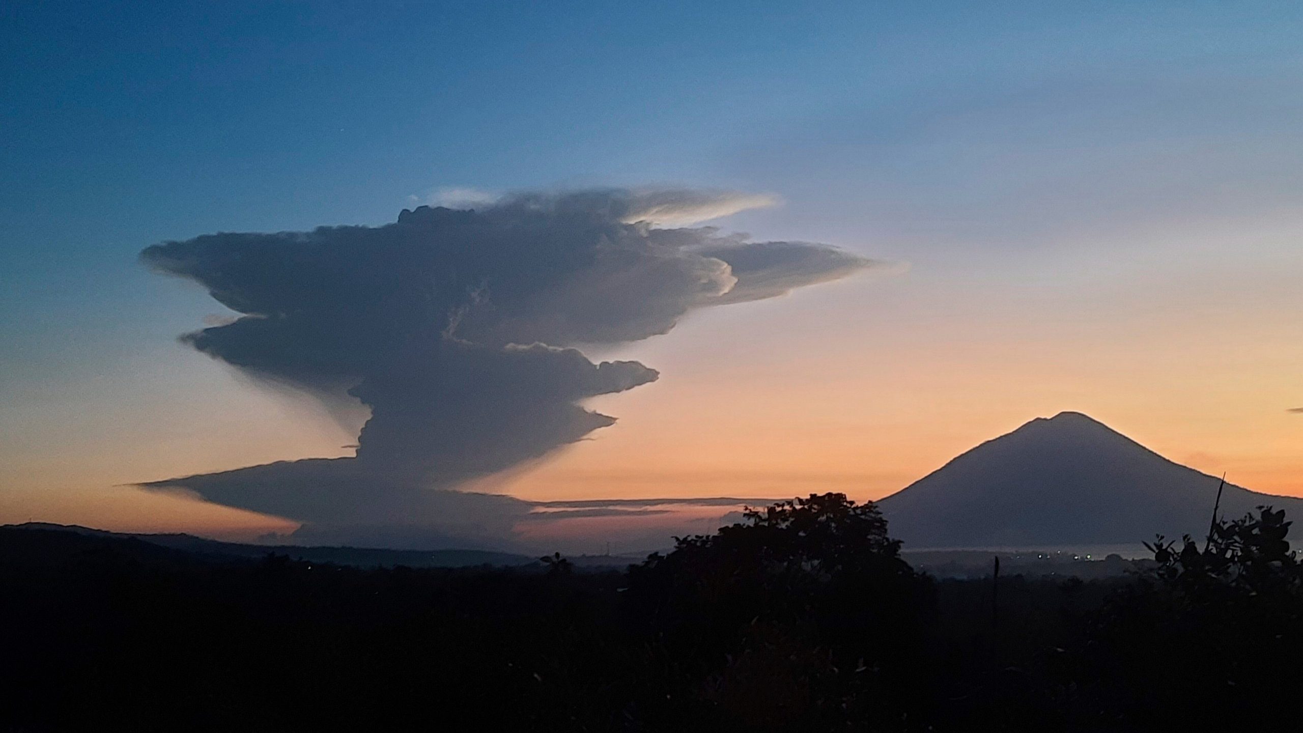 Volcanic smoke billows from Mount Lewotobi Laki-Laki during an eruption, as seen from Lembata, Indonesia, Tuesday, June 17, 2025. (AP Photo/Andre Kriting)