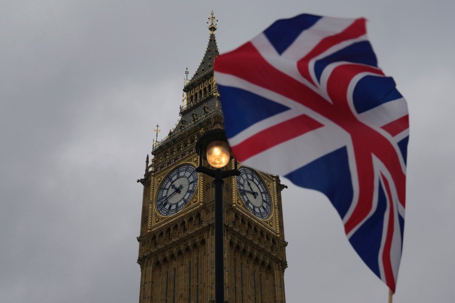 FILE - A Union flag is displayed outside the Houses of Parliament, in London, Thursday, May 23, 2024.(AP Photo/Kin Cheung, File)