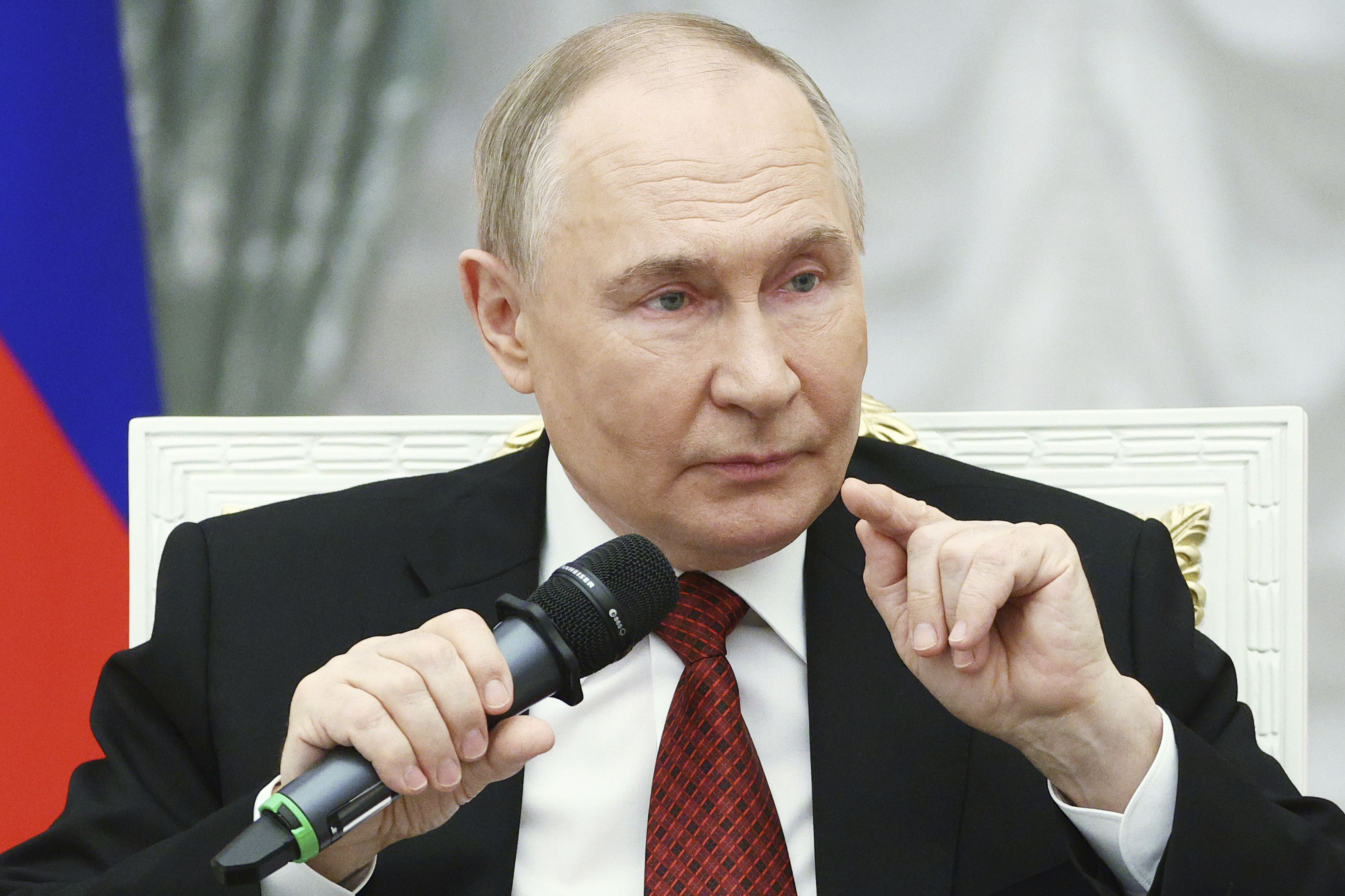 FILE - Russian President Vladimir Putin speaks at the Kremlin in Moscow, Russia, on Thursday, June 12, 2025, with participants of the Time of Heroes, an educational program for veterans of the conflict in Ukraine. (Sergei Bulkin, Sputnik, Kremlin Pool Photo via AP, File)