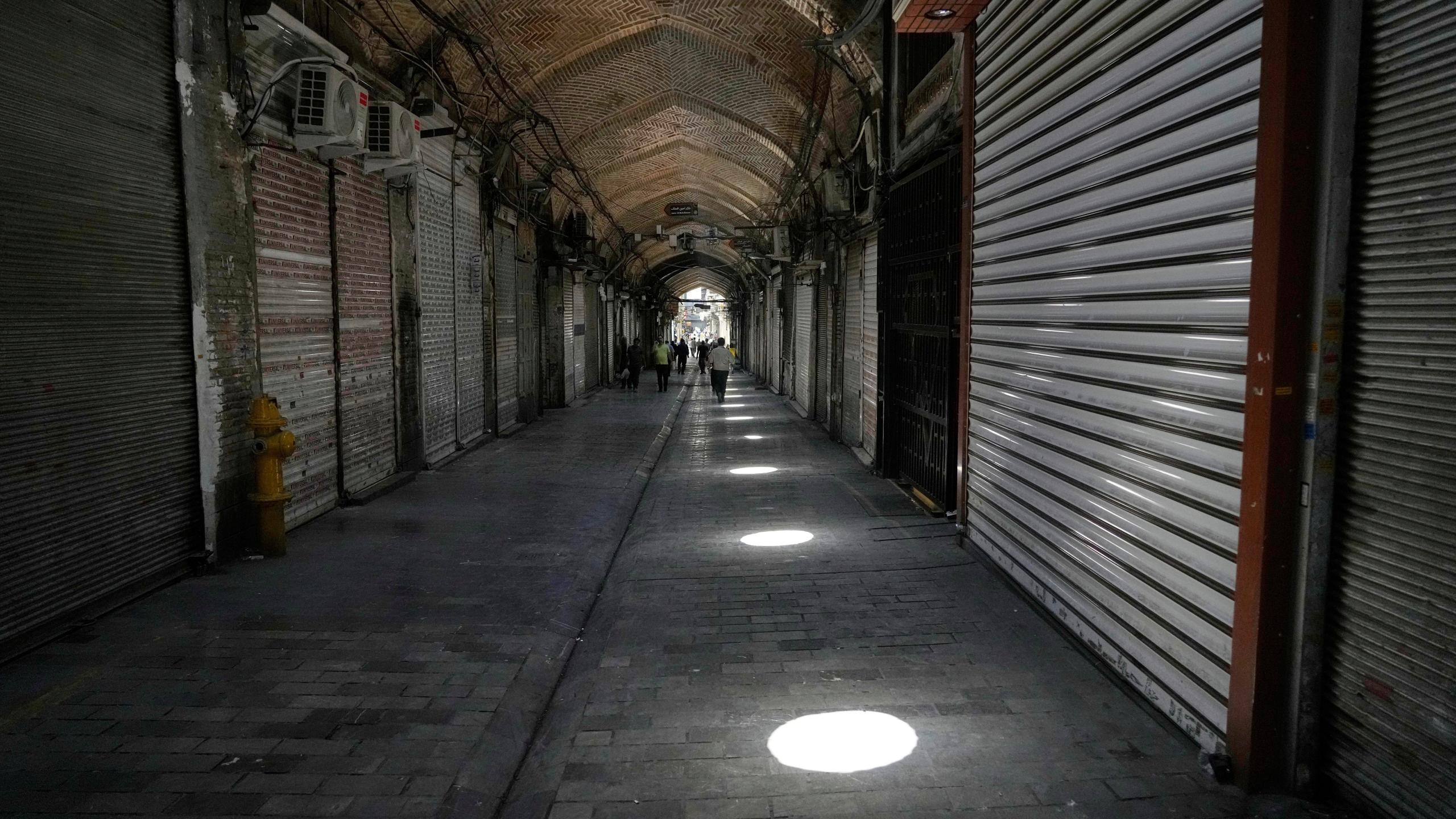 Shops remain shuttered Tehran's historic Grand Bazaar, Monday, June 16, 2025. (AP Photo/Vahid Salemi)