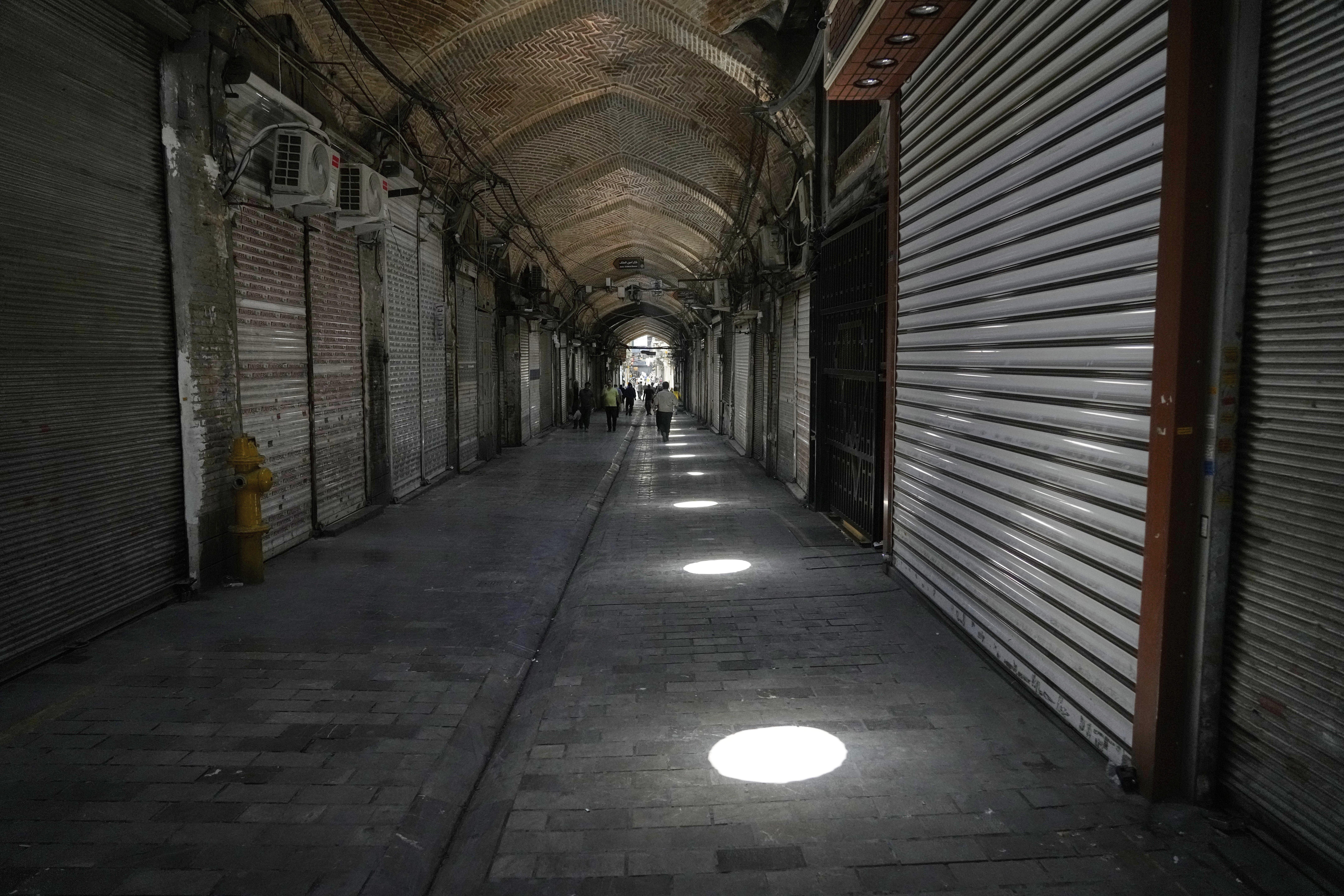 Shops remain shuttered Tehran's historic Grand Bazaar, Monday, June 16, 2025. (AP Photo/Vahid Salemi)