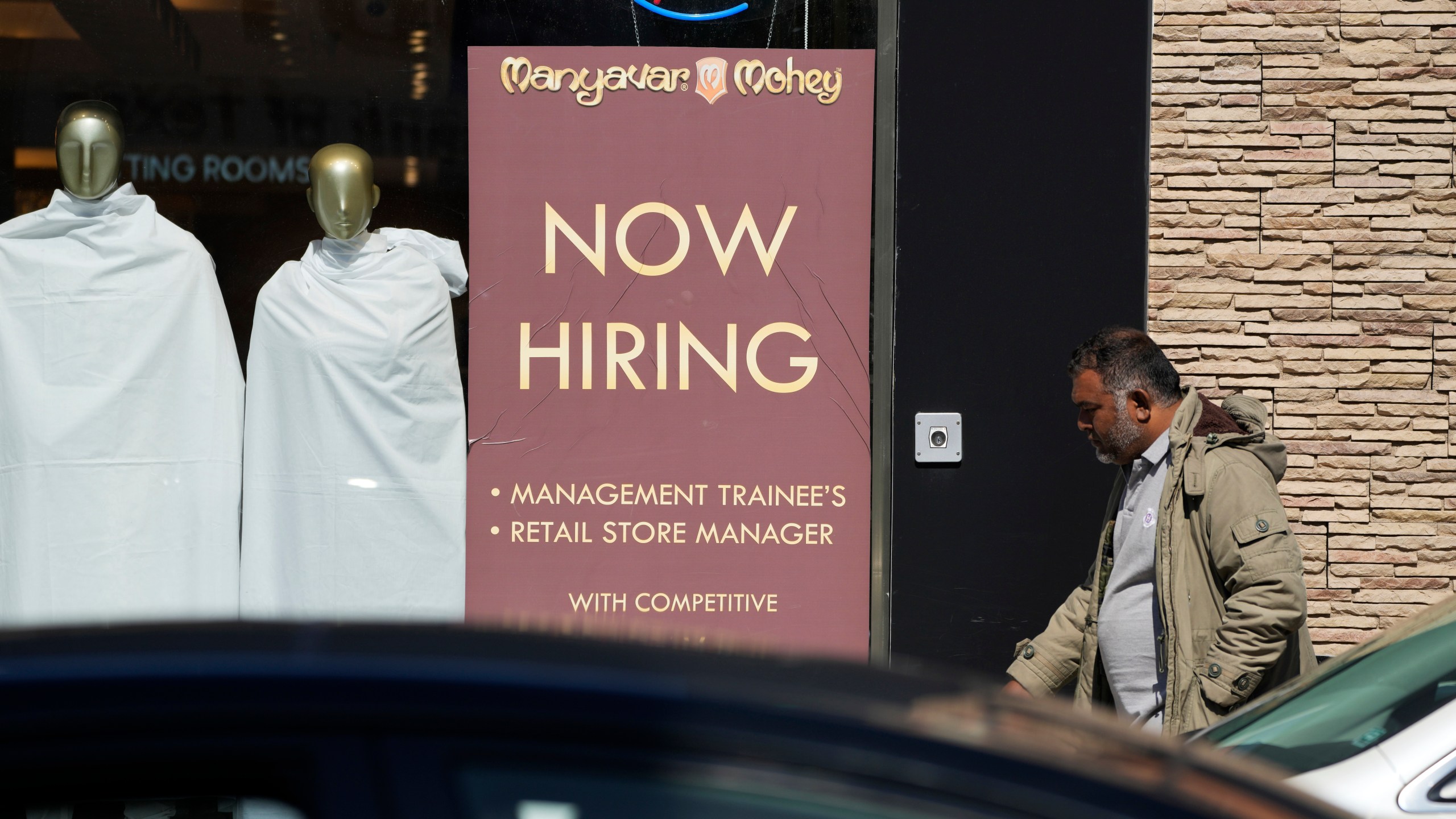 FILE - A hiring sign is displayed at a retail store in Chicago on Monday, March 11, 2024. (AP Photo/Nam Y. Huh, File)