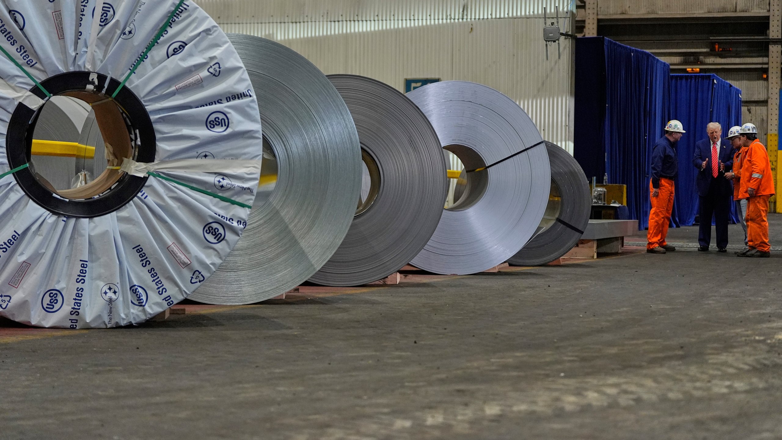 FILE - President Donald Trump talks to workers as he tours U.S. Steel Corporation's Mon Valley Works-Irvin plant, Friday, May 30, 2025, in West Mifflin, Pa. (AP Photo/Julia Demaree Nikhinson, File)