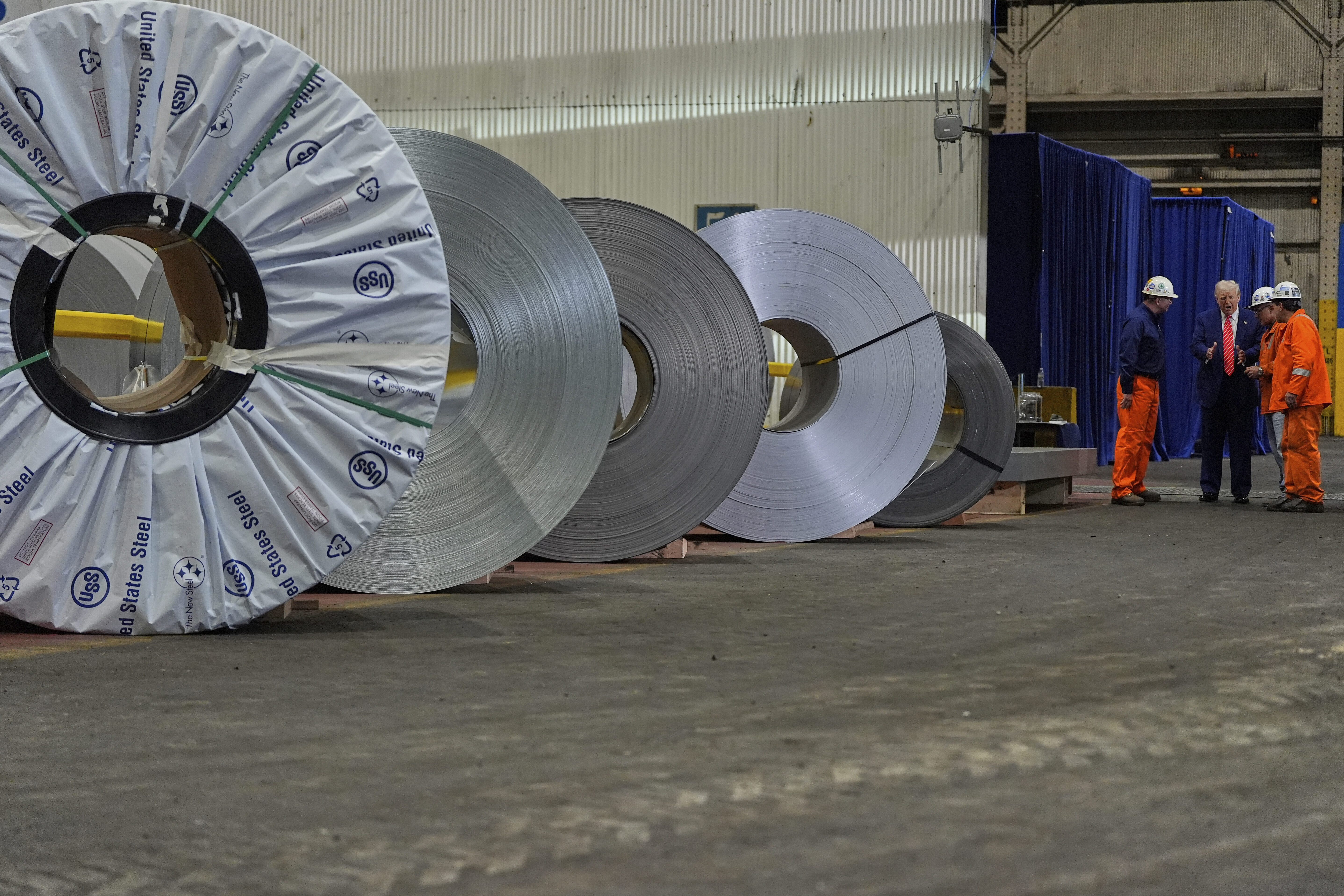 FILE - President Donald Trump talks to workers as he tours U.S. Steel Corporation's Mon Valley Works-Irvin plant, Friday, May 30, 2025, in West Mifflin, Pa. (AP Photo/Julia Demaree Nikhinson, File)