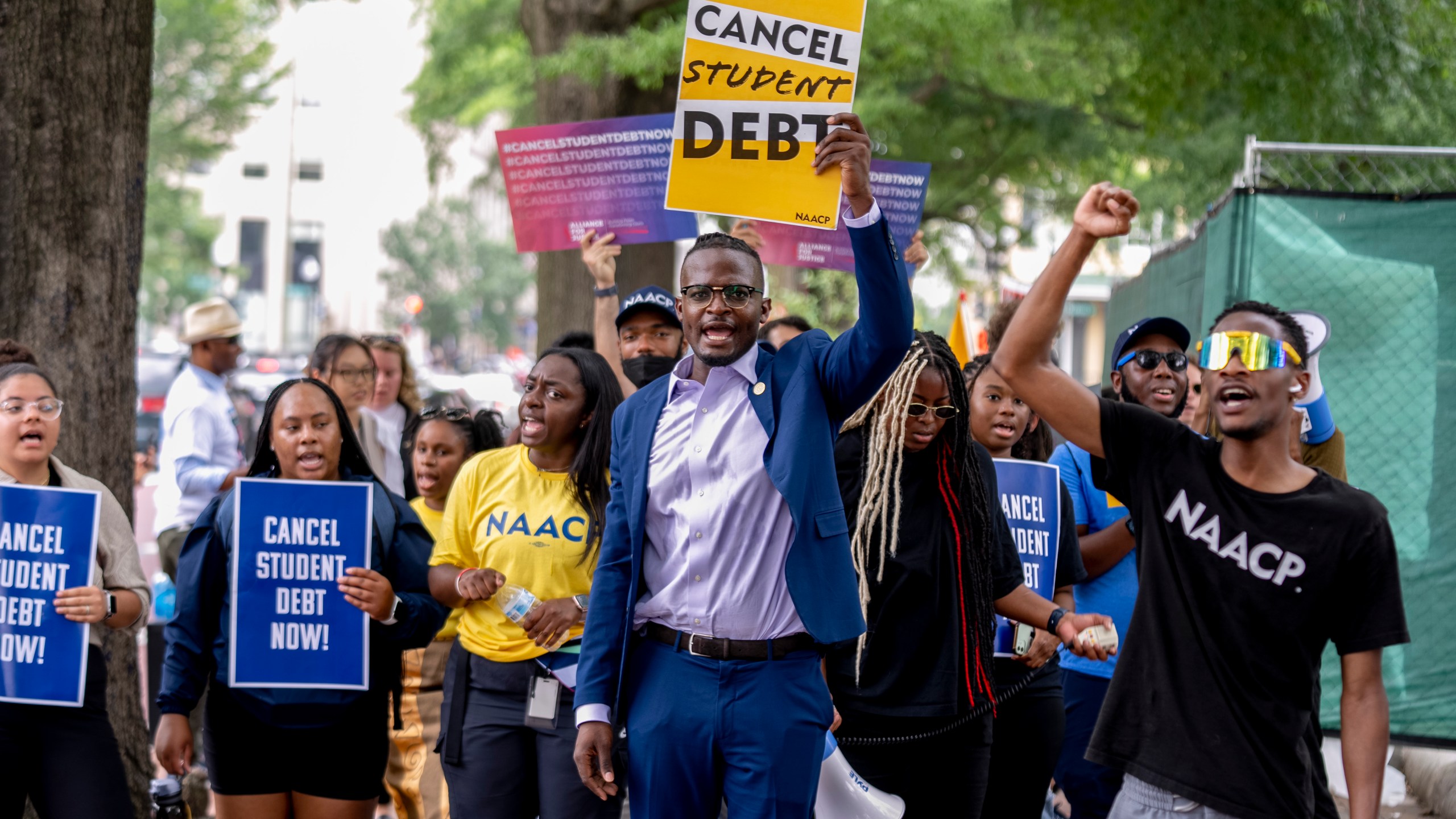 FILE - People demonstrate in Lafayette Park across from the White House in Washington, June 30, 2023, after a sharply divided Supreme Court has ruled that the Biden administration overstepped its authority in trying to cancel or reduce student loan debts for millions of Americans. (AP Photo/Andrew Harnik, File)