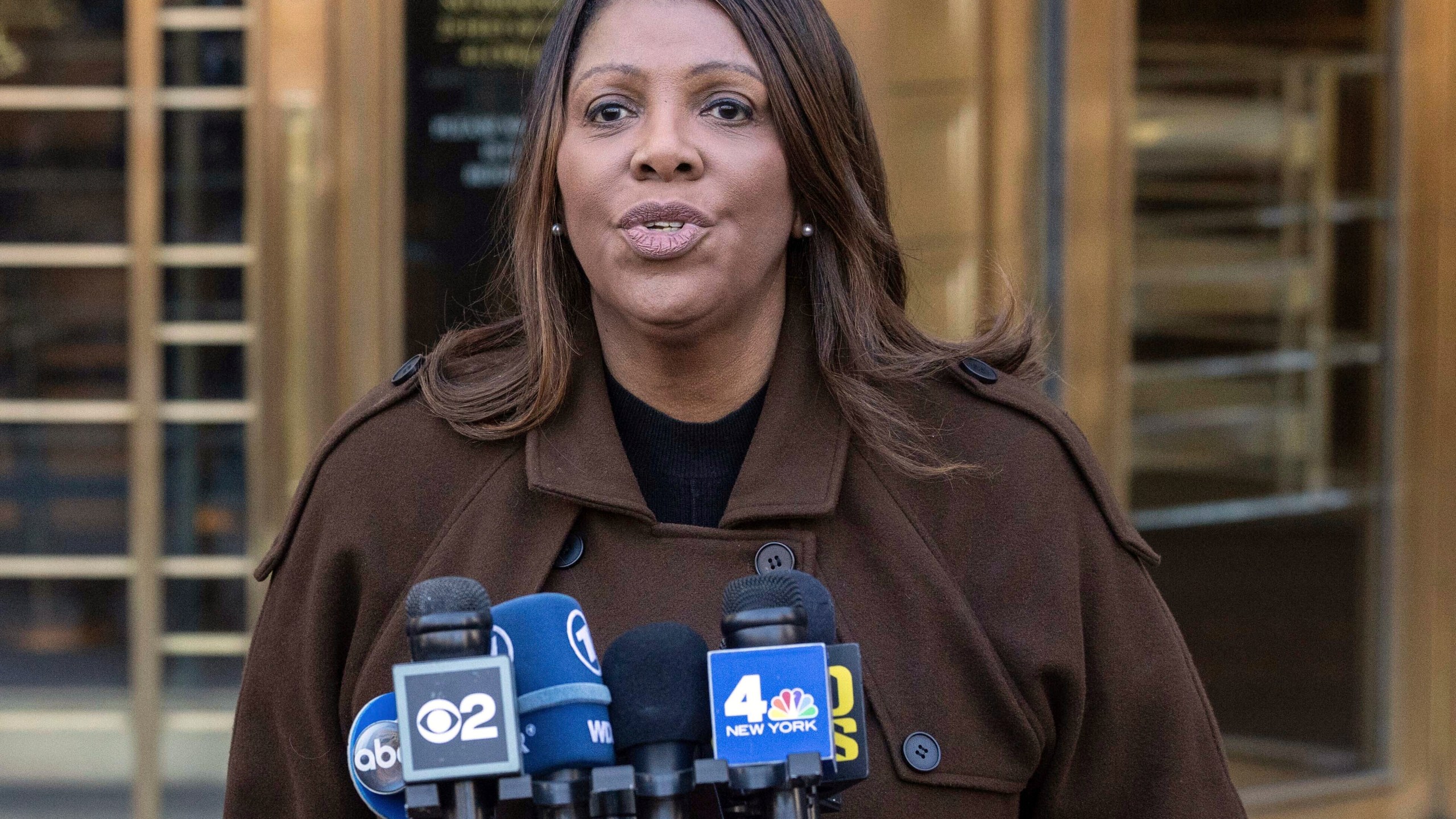 FILE - New York Attorney General Letitia James speaks during a news conference outside Manhattan federal court in New York on Feb. 14, 2025. (AP Photo/Yuki Iwamura, File)