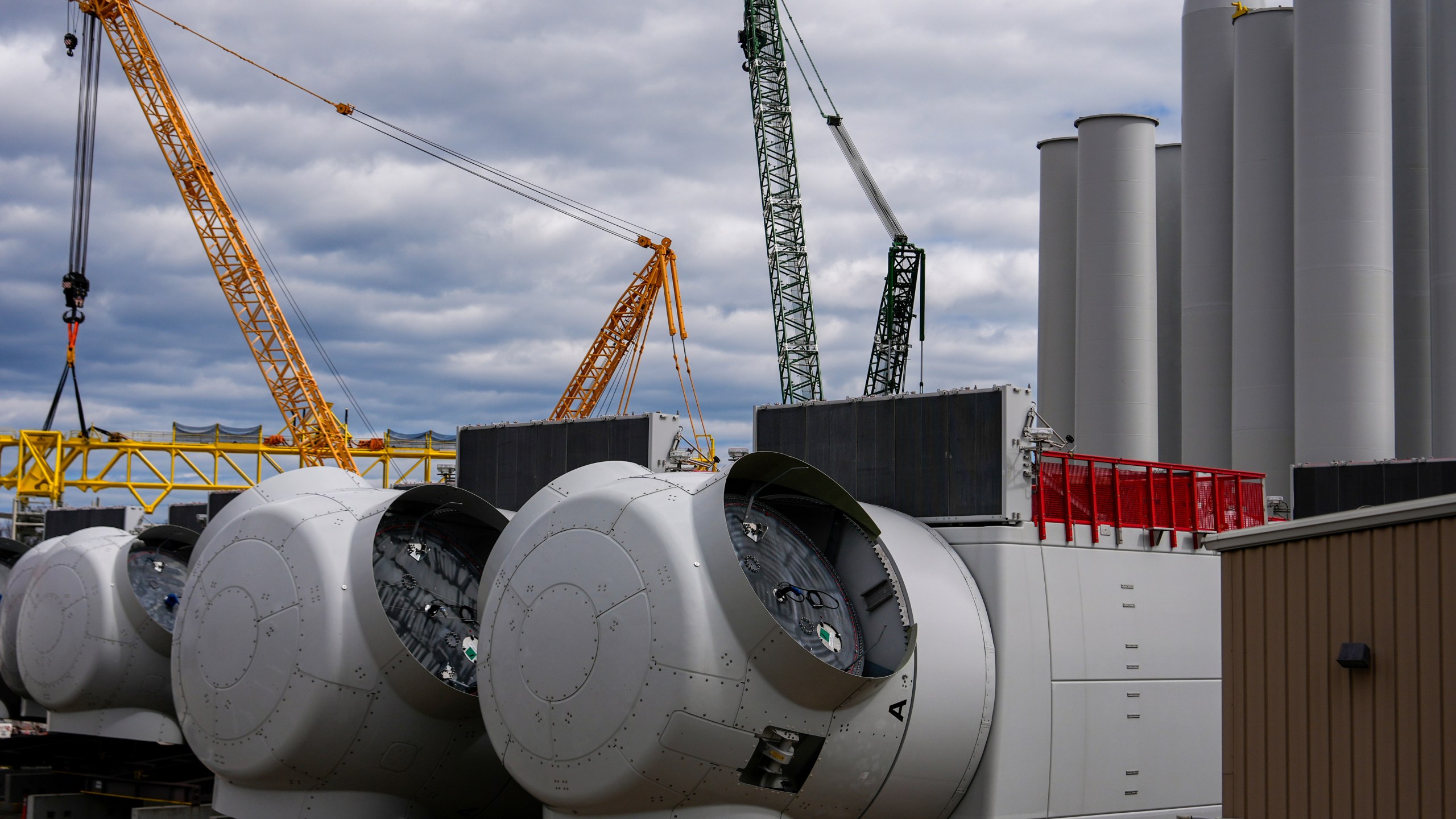 FILE - Wind turbine components are visible at New London State Pier, April 16, 2025, in New London, Conn. (AP Photo/Julia Demaree Nikhinson, File)