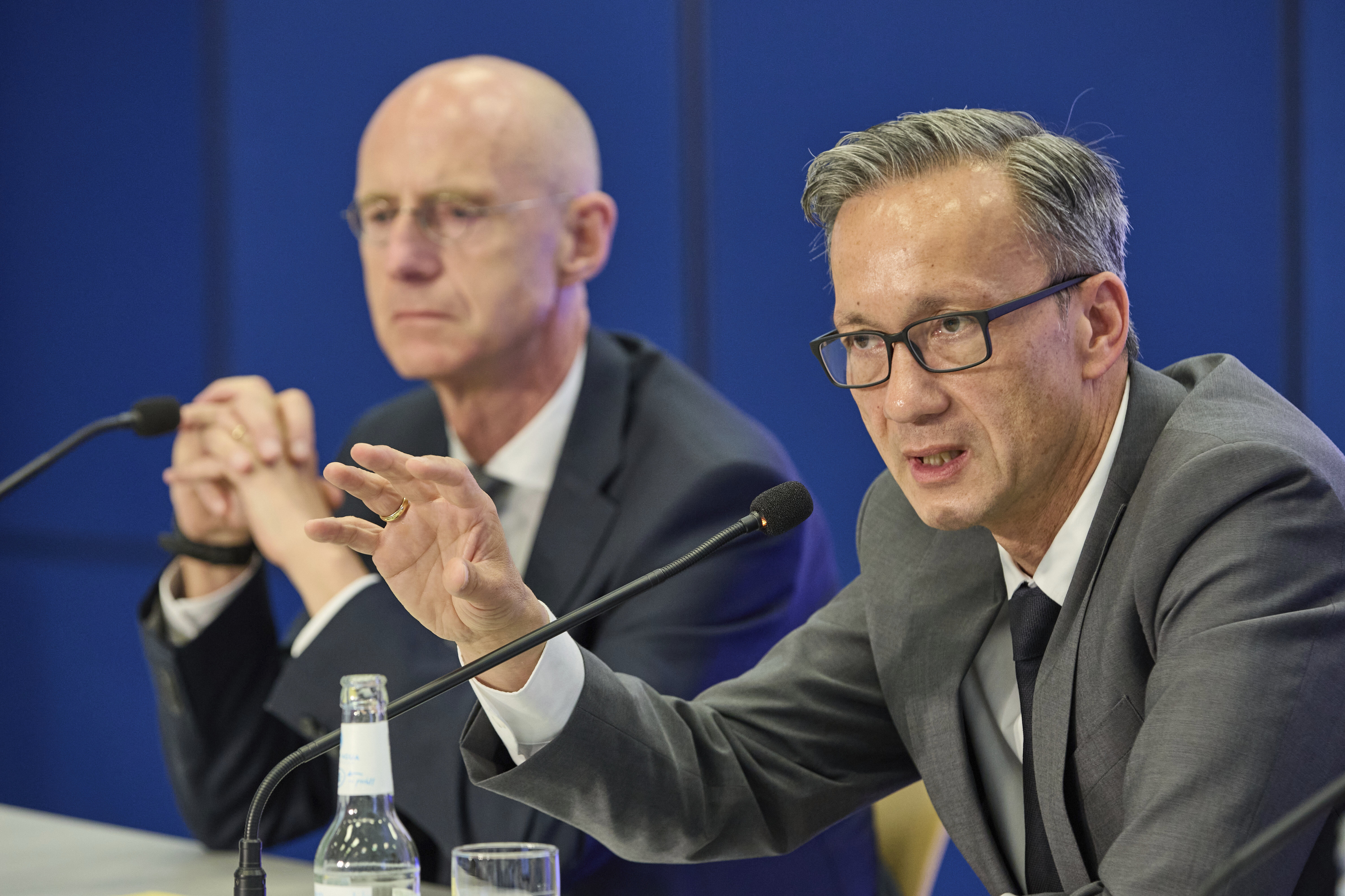 Chief Public Prosecutor Joerg Froehlich, left, and Chief of Police Falk Schnabel give a press conference by the police and Chief Public Prosecutor at police headquarters after a 20-year-old was arrested on suspicion of murdering a child, in Hamburg, Germany, Wednesday, June 18, 2025. (Georg Wendt/dpa via AP)