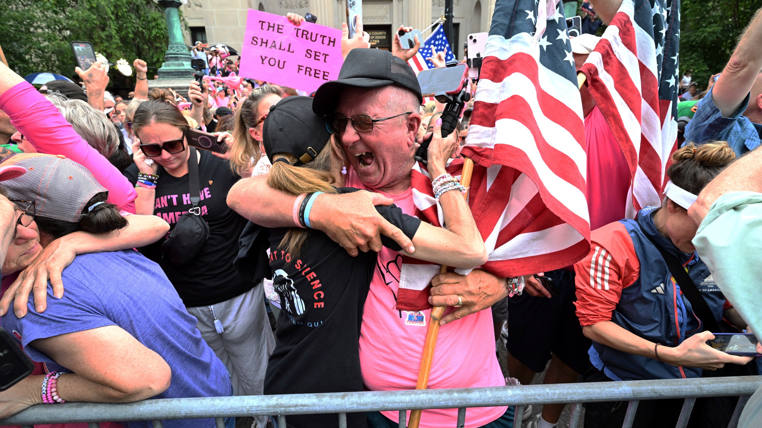 Supporters of Karen Read react after she was found not guilty of second-degree murder on Wednesday, June 18, 2025, in Dedham, Mass. (AP Photo/Josh Reynolds)