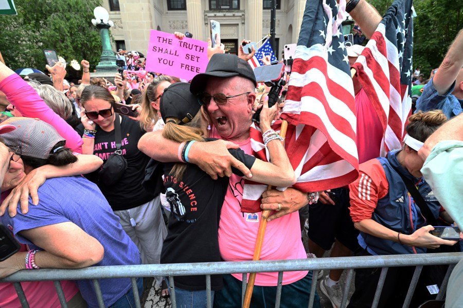 Supporters of Karen Read react after she was found not guilty of second-degree murder on Wednesday, June 18, 2025, in Dedham, Mass. (AP Photo/Josh Reynolds)