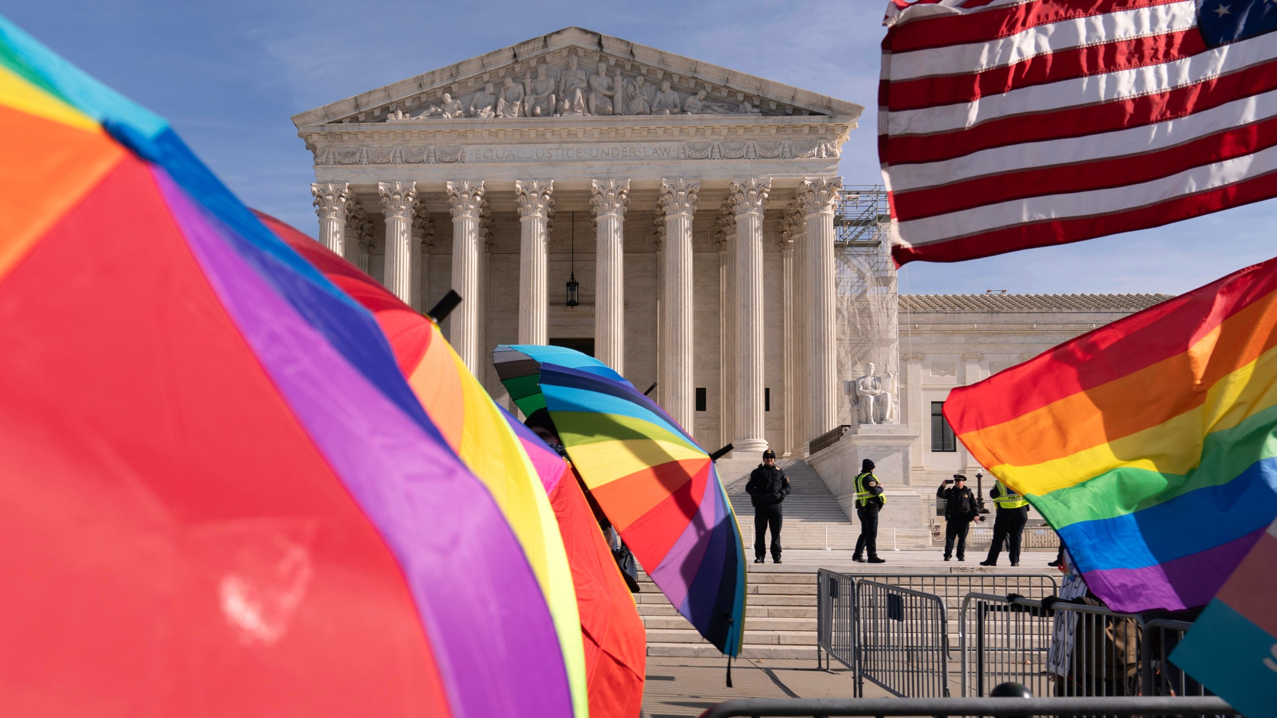 FILE - Transgenders rights supporters rally outside of the Supreme Court, Dec. 4, 2024, in Washington. (AP Photo/Jose Luis Magana, File)