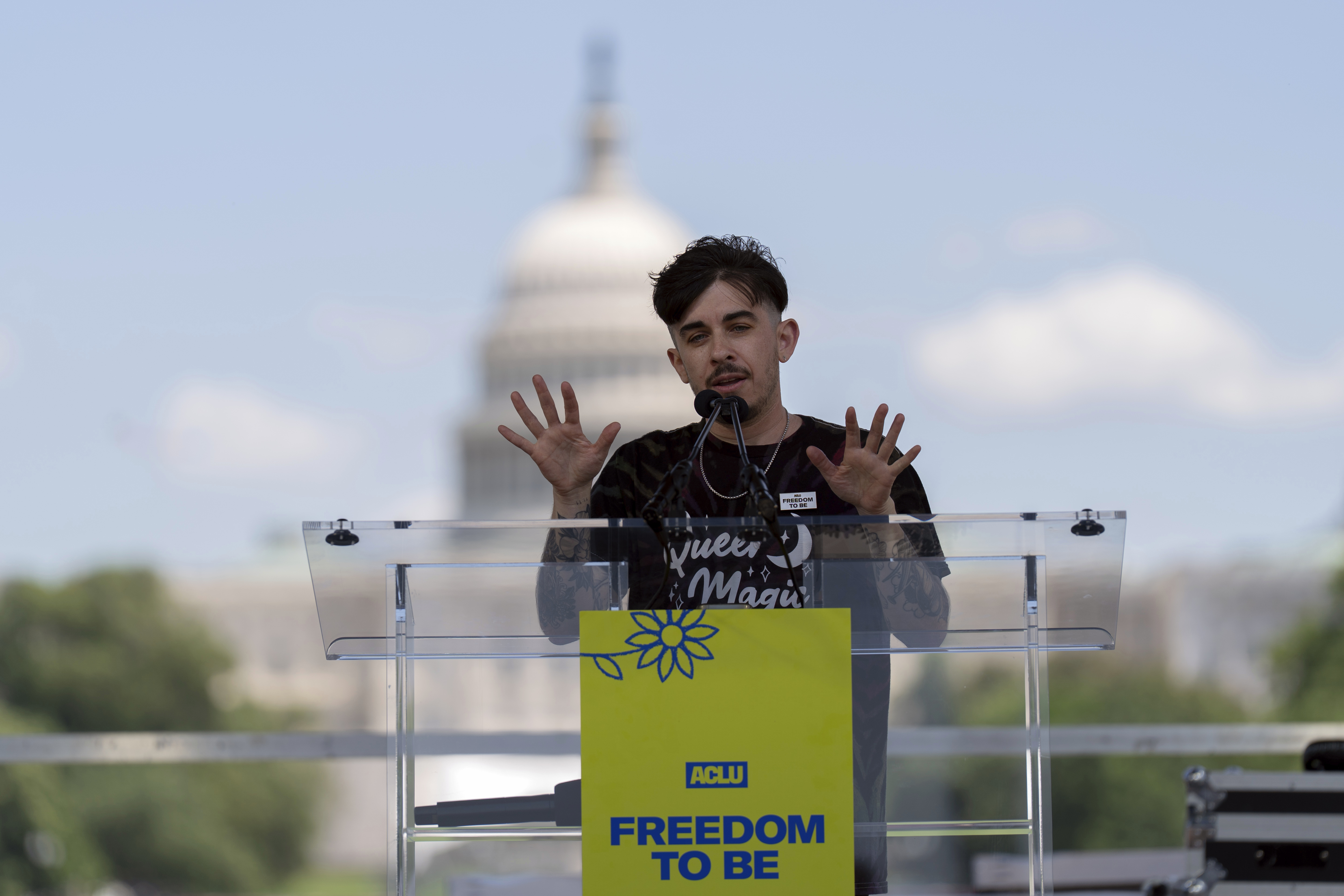 FILE - Chase Strangio, co-director of the ACLU's LGBT & HIV Project, speaks during the transgender rights rally on the National Mall, Saturday, May 17, 2025, in Washington. (AP Photo/Jose Luis Magana)
