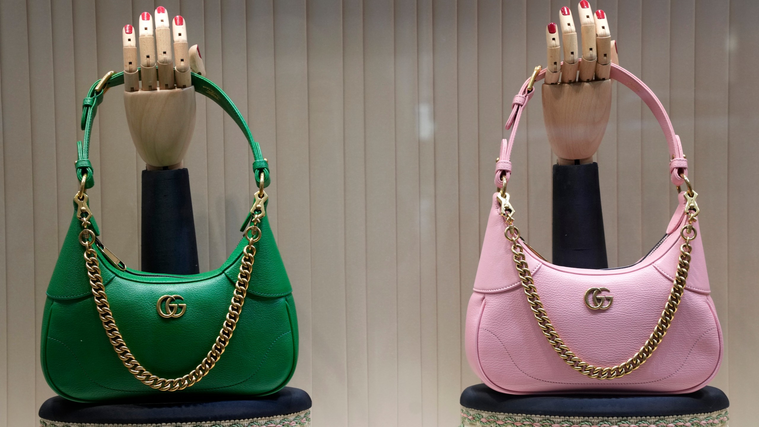 FILE - These are Gucci bags in the window of a Gucci store in Pittsburgh on Jan. 30, 2023. (AP Photo/Gene J. Puskar, File)