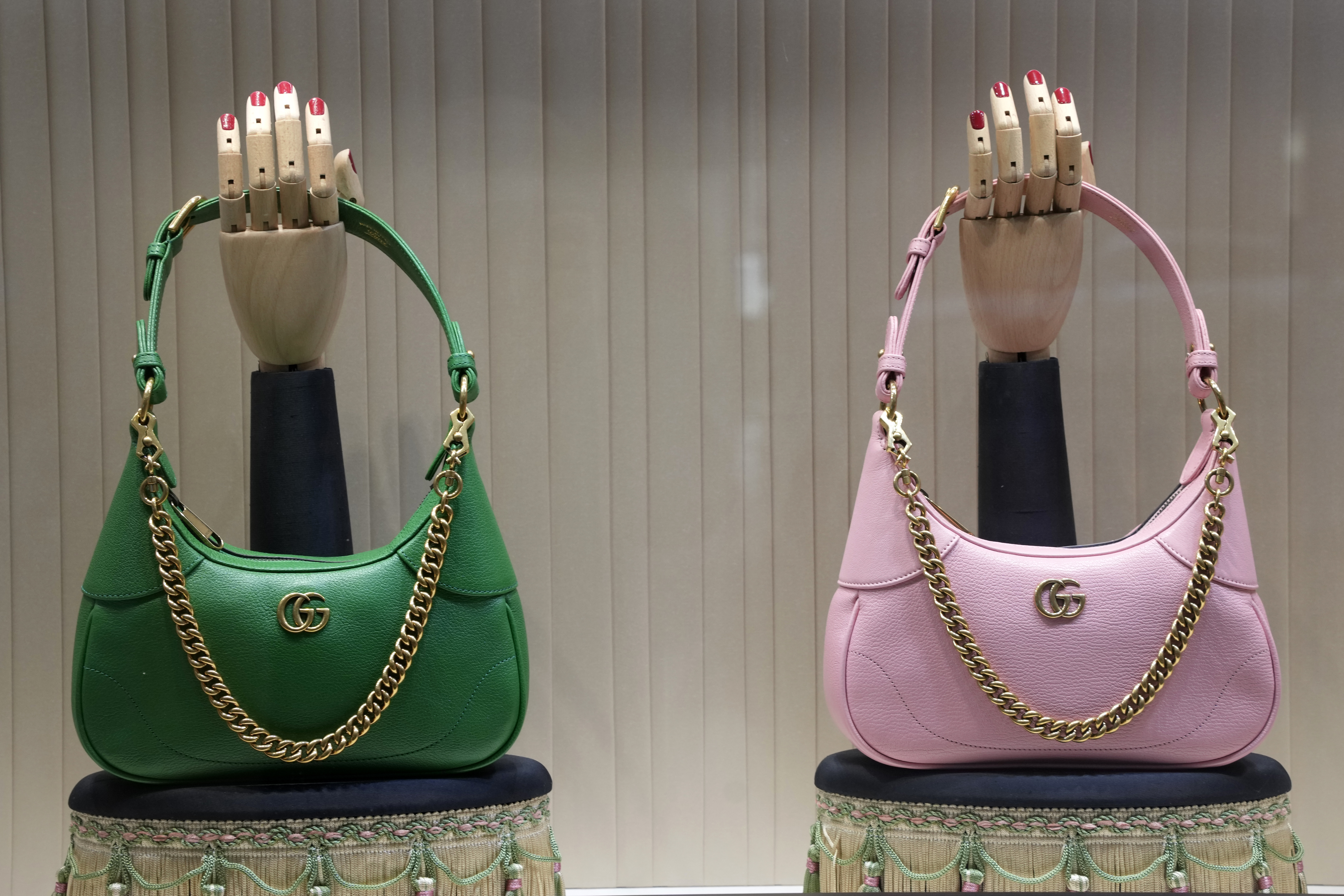 FILE - These are Gucci bags in the window of a Gucci store in Pittsburgh on Jan. 30, 2023. (AP Photo/Gene J. Puskar, File)