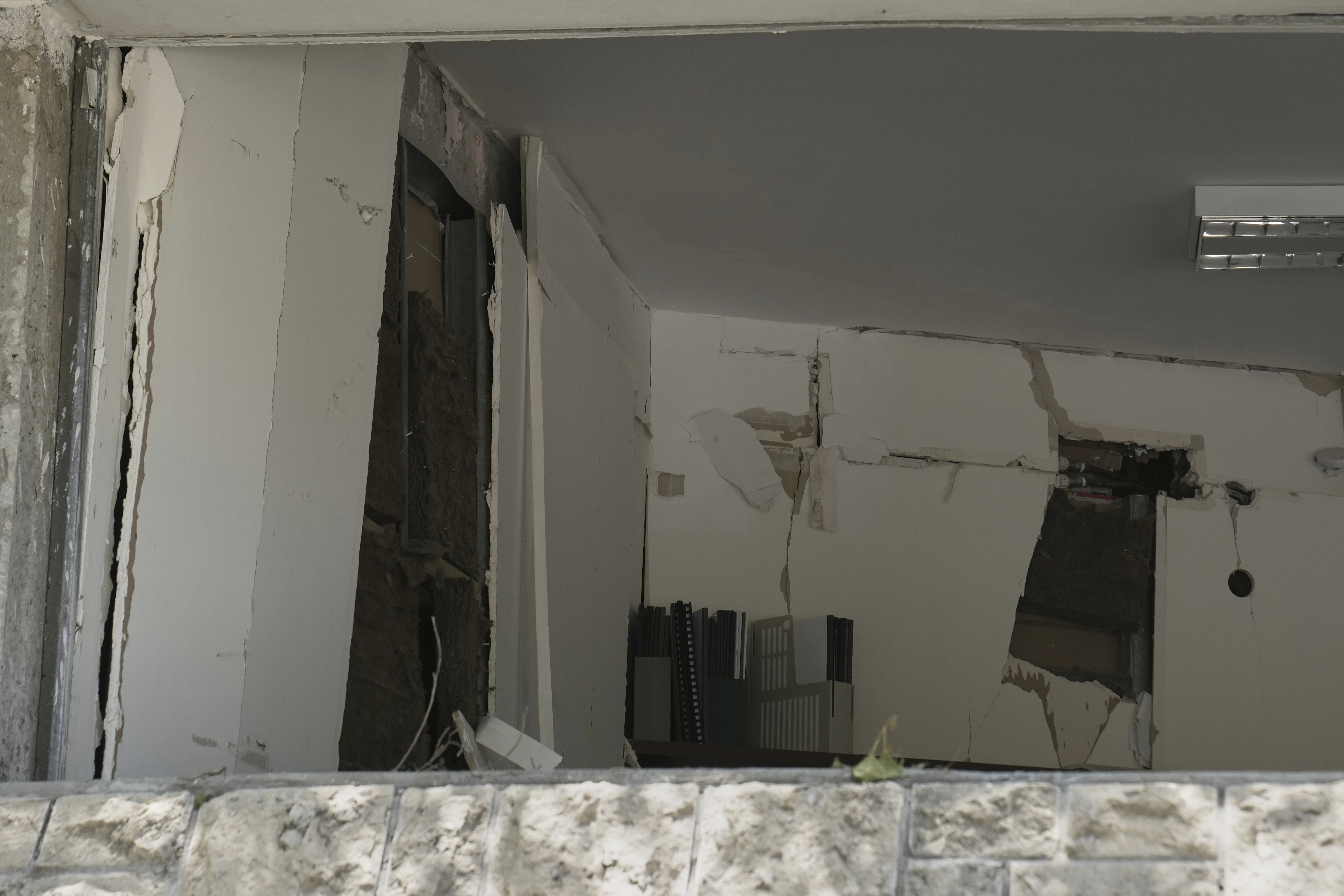 An office inside a building at the Weizmann Institute of Science damaged by an Iranian missile is seen in Rehovot, Thursday, June 19, 2025. (AP Photo/Maya Alleruzzo)
