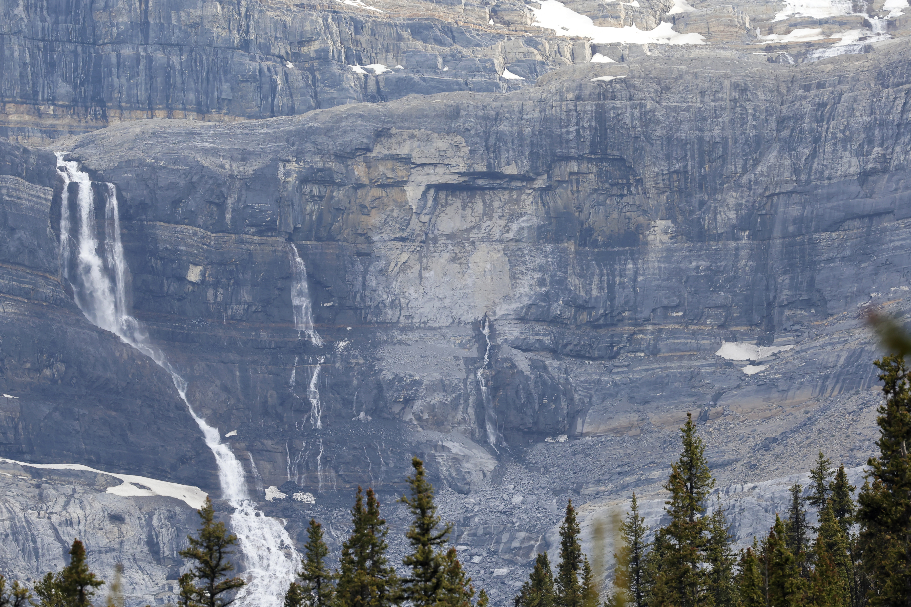 A rock slide, center, is seen near Bow Glacier Falls, north of Lake Louise, Alta. in Banff National Park on Thursday, June 19, 2025. (Larry MacDougal/The Canadian Press via AP)