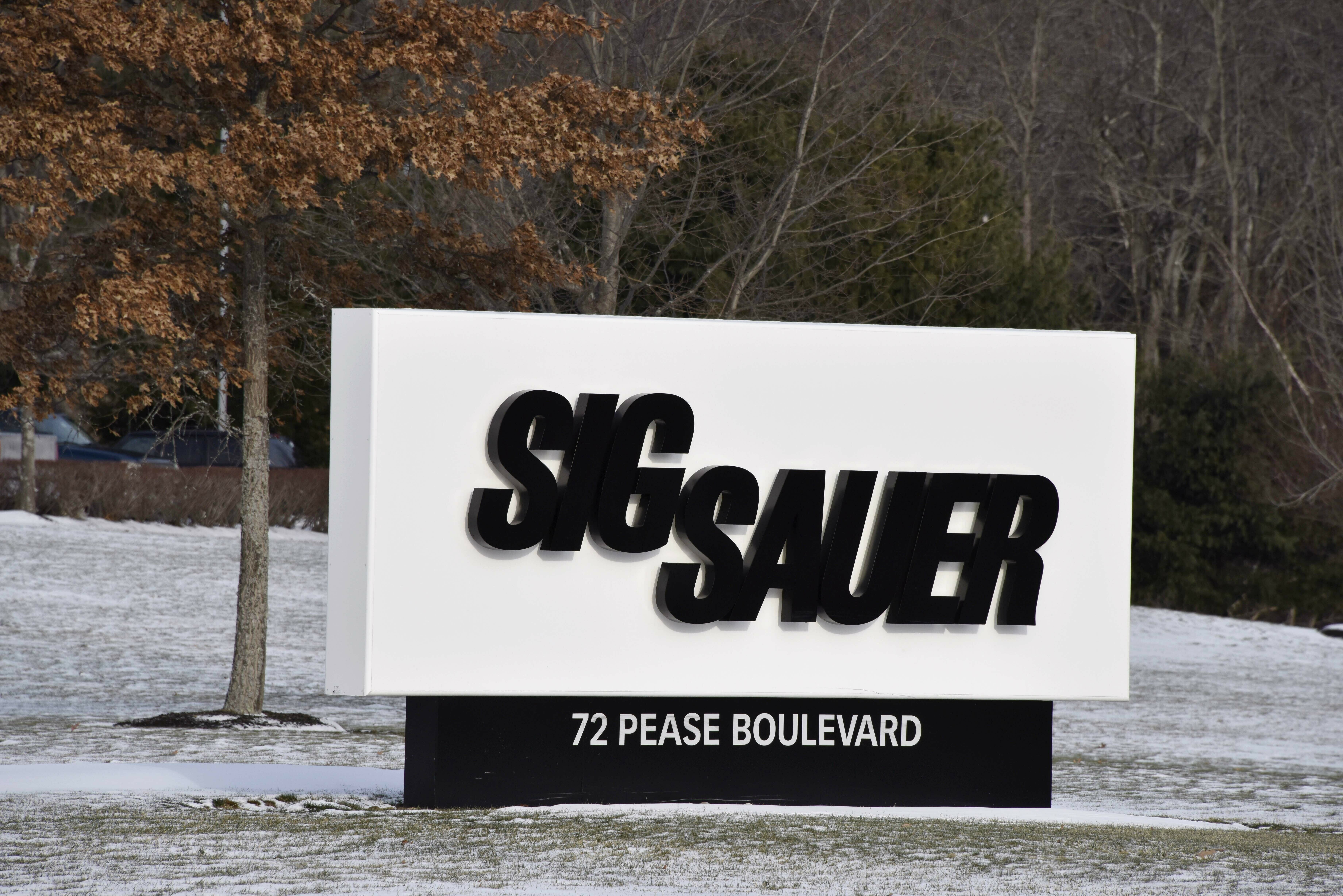 This Jan. 14, 2016, file photo shows the sign at the entrance to the headquarters of Sig Sauer, a gun manufacturer based in Newington, N.H. (AP Photo/Lisa Marie Pane, file)