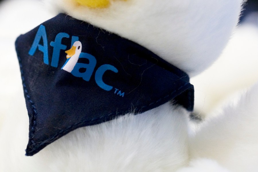 FILE - An Aflac logo is seen on a toy duck on March 27, 2008 in New York. (AP Photo/Mark Lennihan, File)