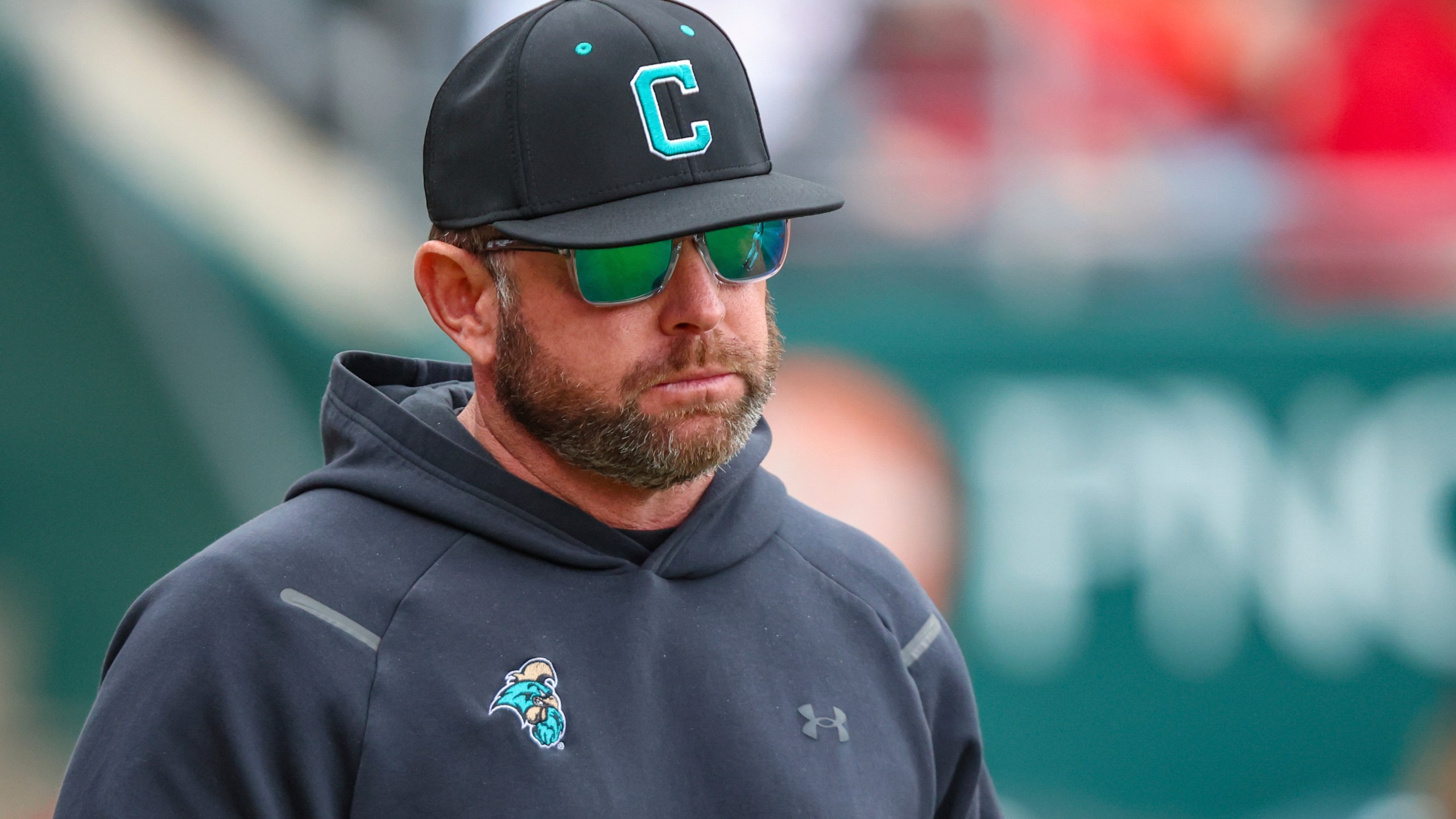FILE - Coastal Carolina head coach Kevin Schnall walks onto the field during an NCAA baseball game against Ohio State in Jacksonville, Fla., Feb. 22, 2025. (AP Photo/Gary McCullough, file)