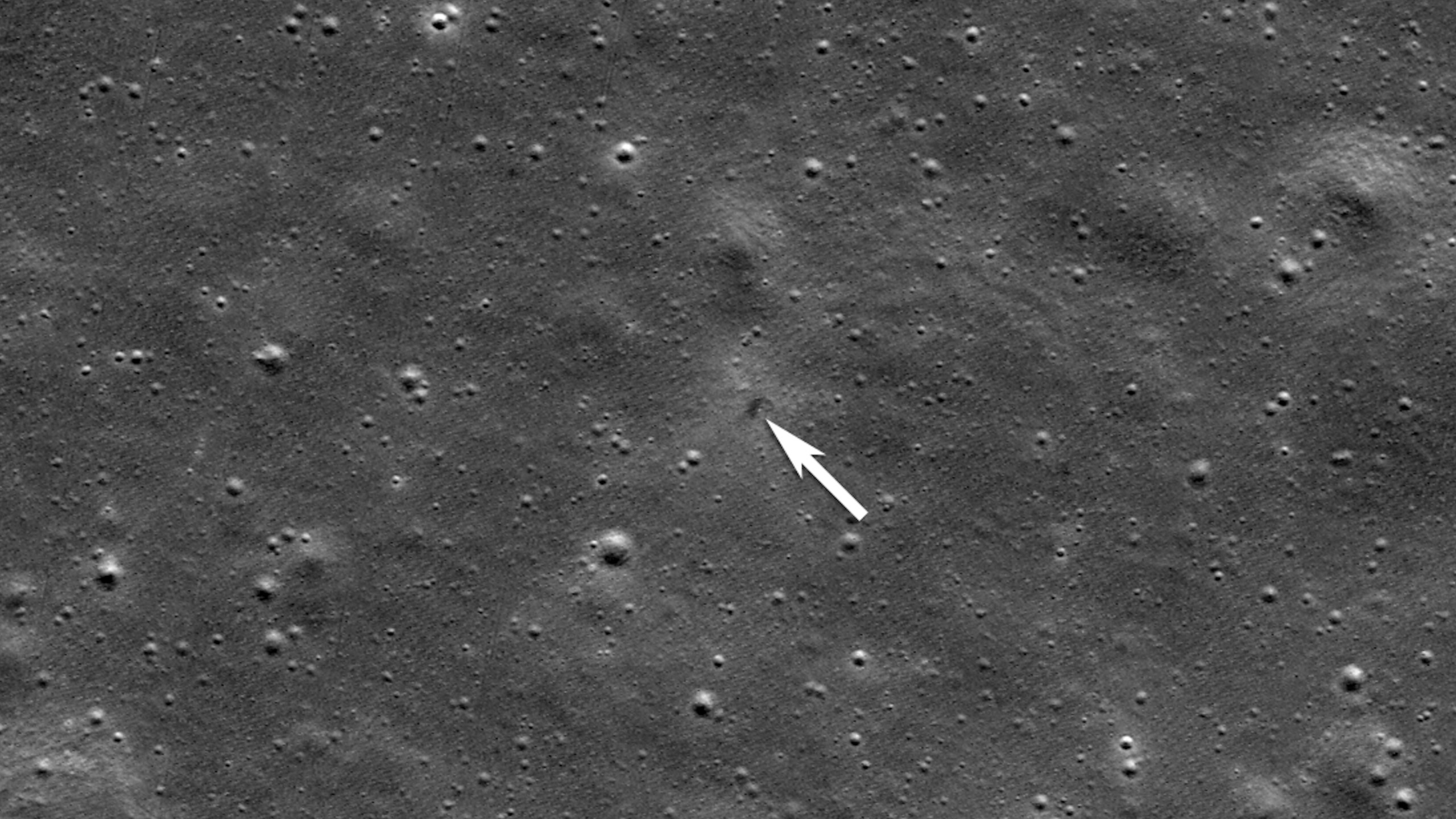 This image provided by NASA shows an annotation indicating the impact site for ispace's Resilience lunar lander, seen by the Lunar Reconnaissance Orbiter Camera on June 11, 2025. (NASA/Goddard/Arizona State University via AP)