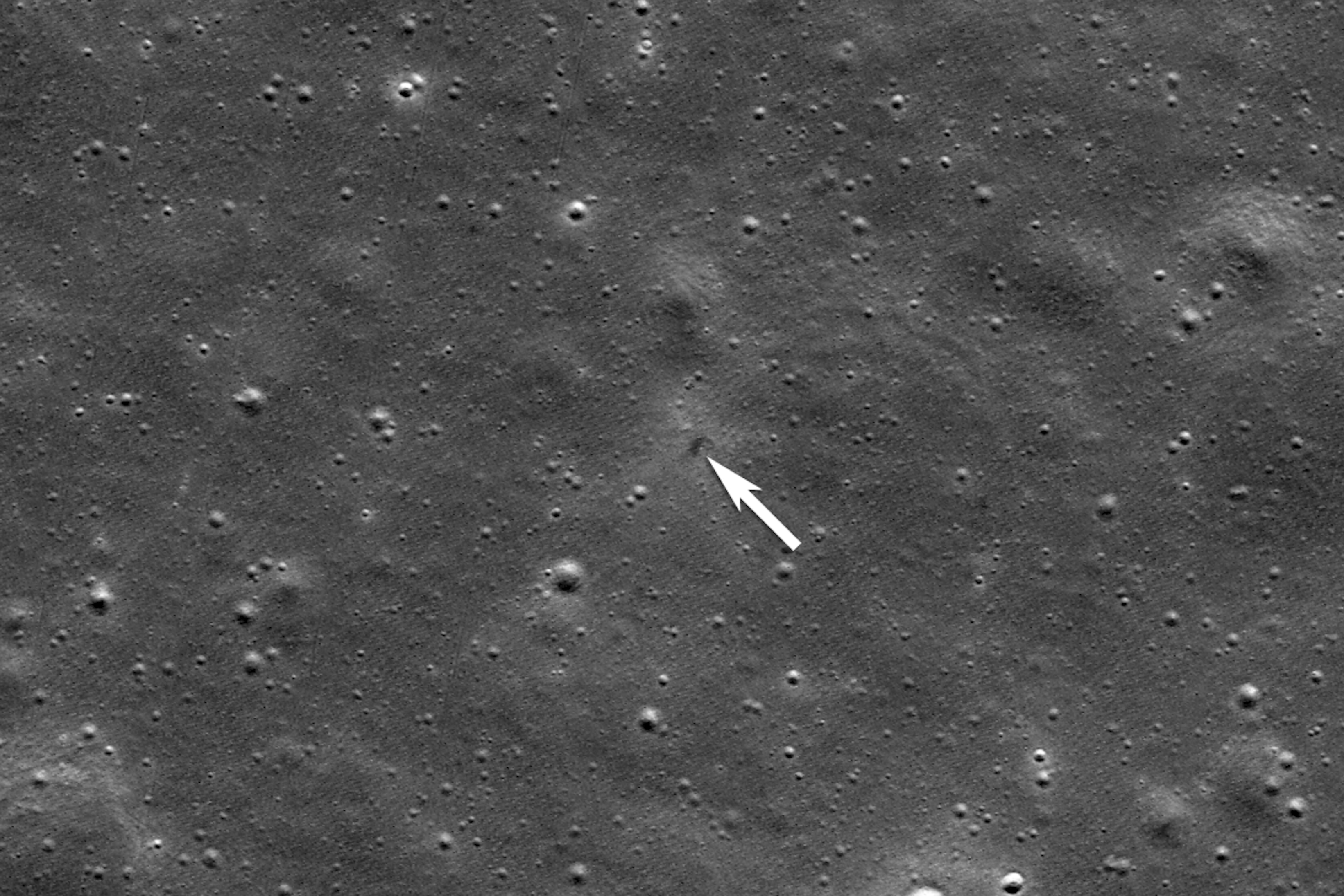 This image provided by NASA shows an annotation indicating the impact site for ispace's Resilience lunar lander, seen by the Lunar Reconnaissance Orbiter Camera on June 11, 2025. (NASA/Goddard/Arizona State University via AP)