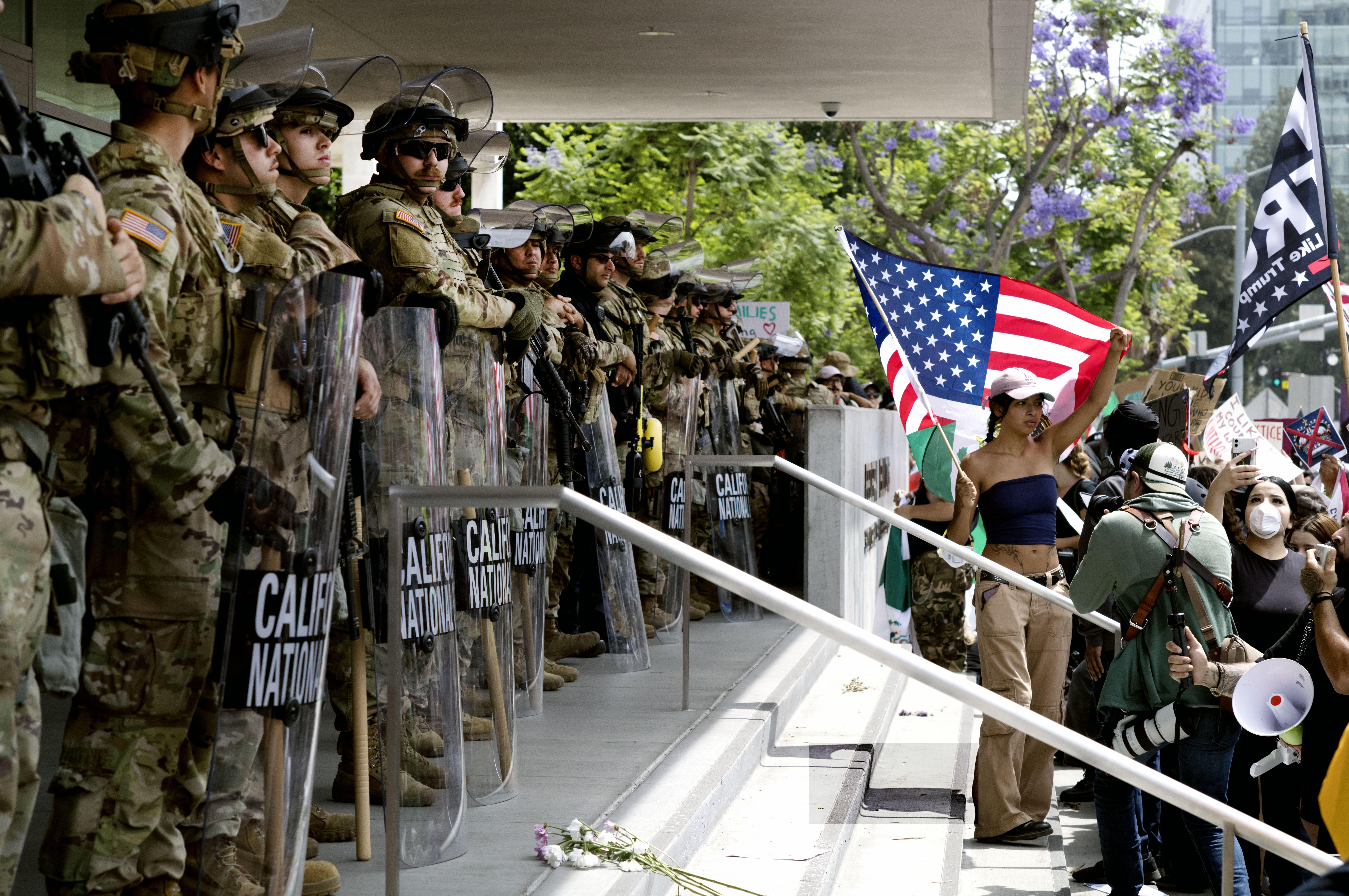 Protesters stand off against California National Guard soldiers at the Federal Building in downtown Los Angeles during a "No Kings" protest on Saturday, June 14, 2025. (AP Photo/Richard Vogel)