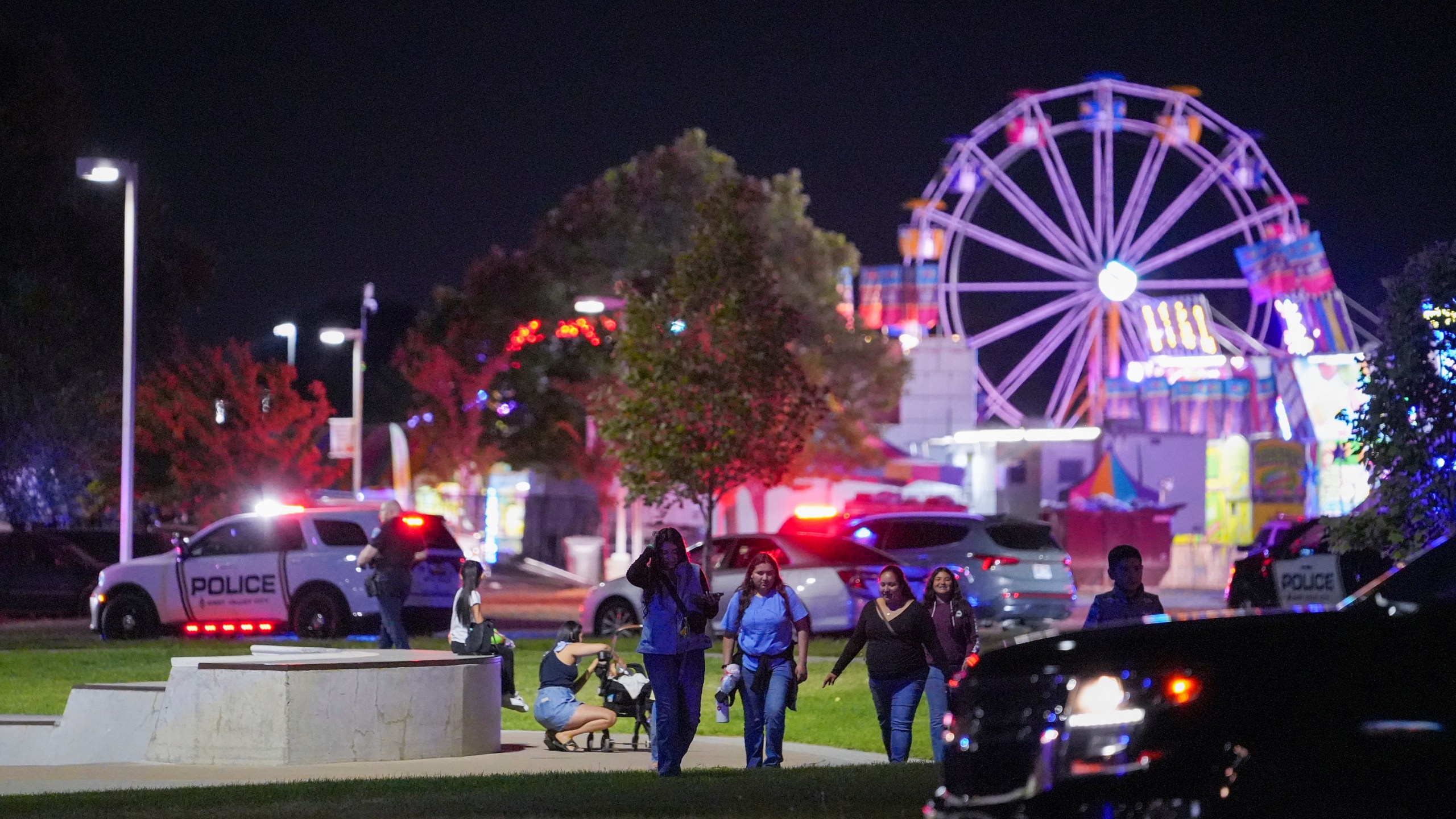 Police say a 16-year-old boy shot five people, killing three including an 8-month-old infant, in a confrontation between two groups at a carnival, June 15, 2025, in West Valley City, Utah. (Chris Samuels/The Salt Lake Tribune via AP) **NOT AN AP MEMBER**