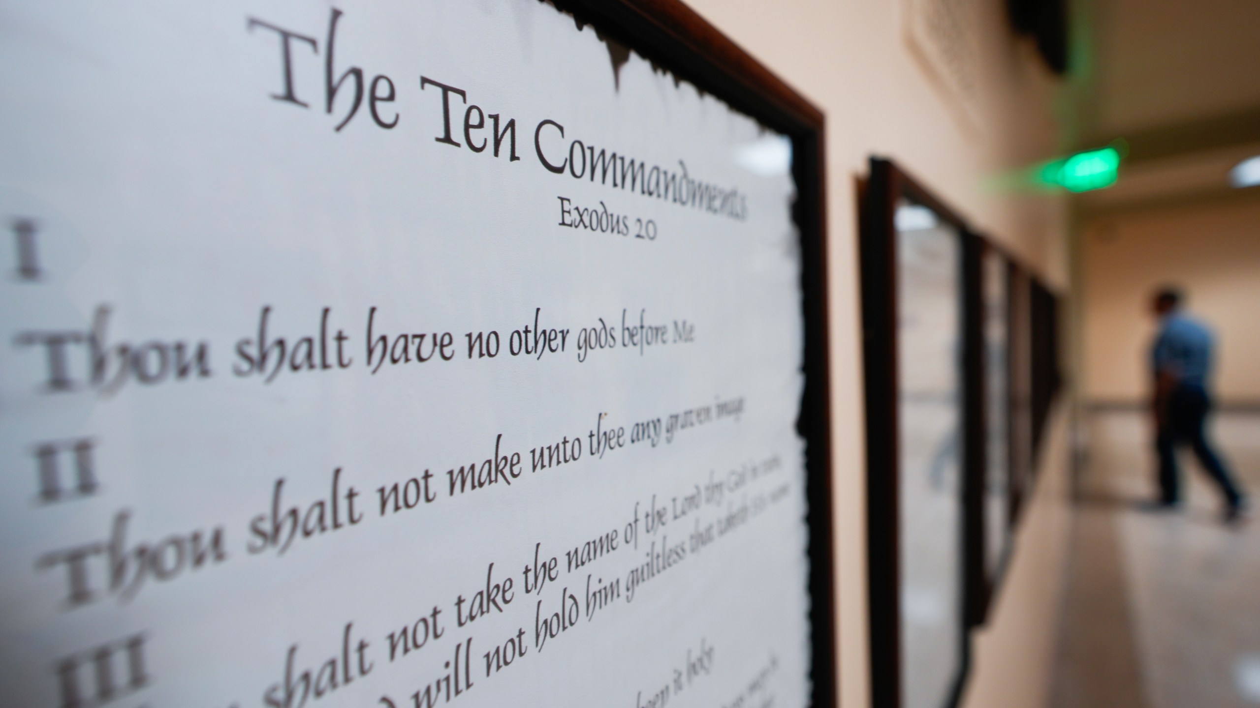 FILE - A copy of the Ten Commandments is posted along with other historical documents in a hallway at the Georgia Capitol on June 20, 2024, in Atlanta. (AP Photo/John Bazemore, File)
