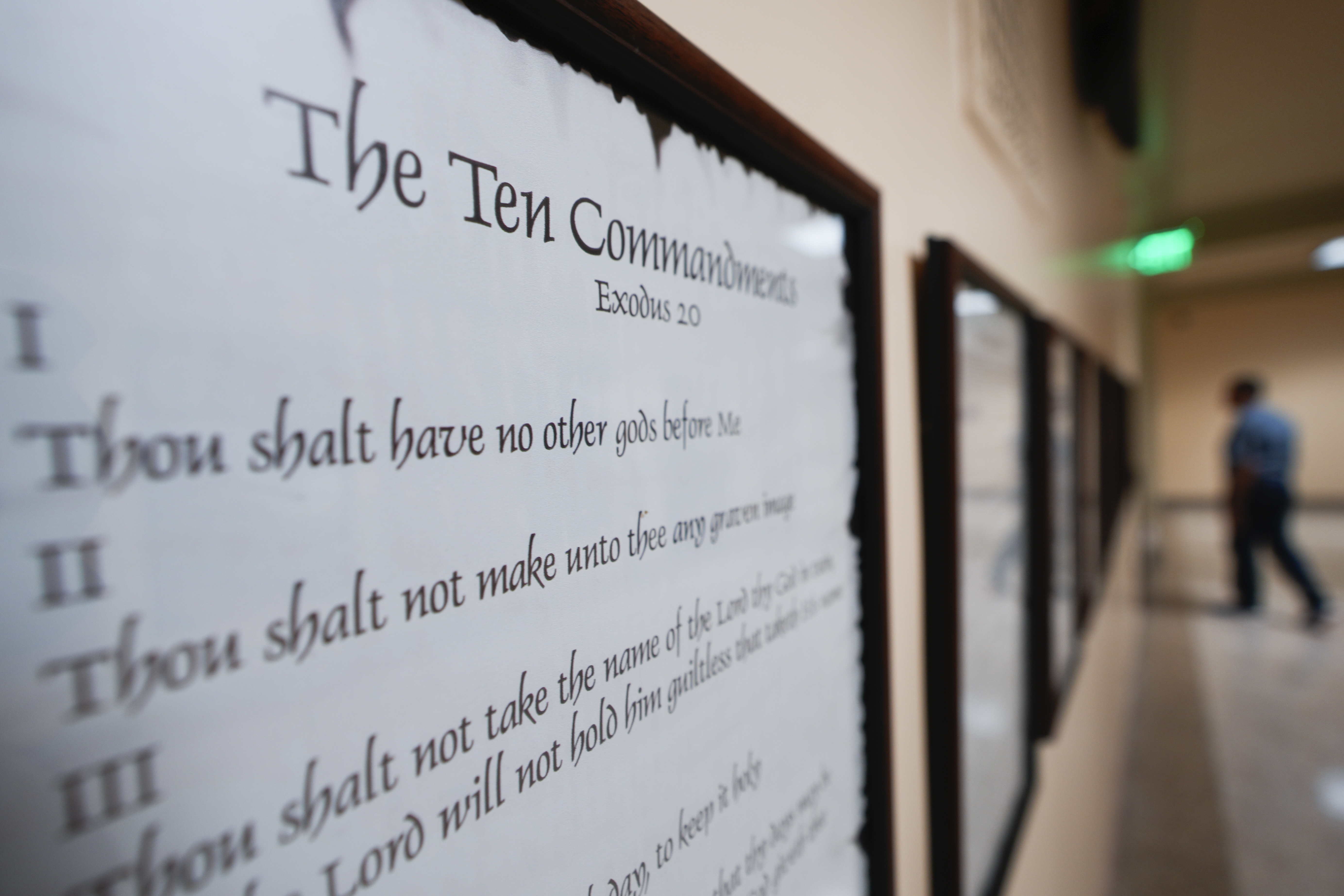 FILE - A copy of the Ten Commandments is posted along with other historical documents in a hallway at the Georgia Capitol on June 20, 2024, in Atlanta. (AP Photo/John Bazemore, File)