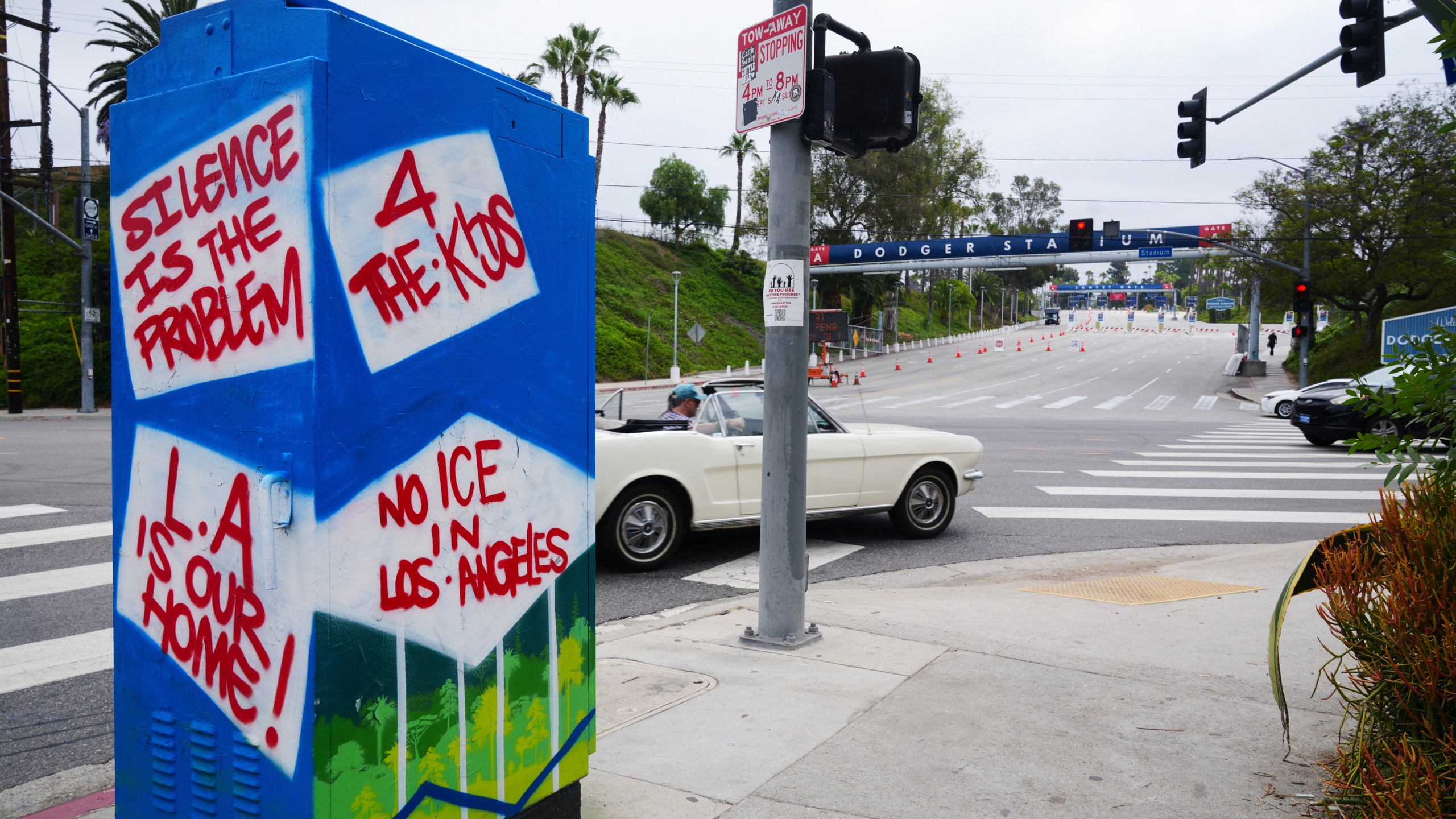 An art installation critical of immigration enforcement stands outside Dodger Stadium on Friday, June 20, 2025, in Los Angeles. (AP Photo/Damian Dovarganes)