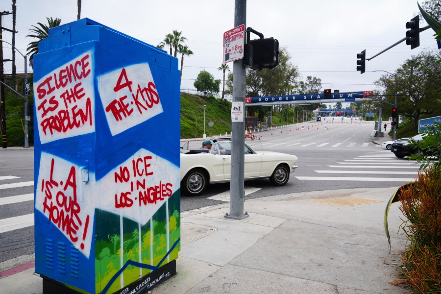 An art installation critical of immigration enforcement stands outside Dodger Stadium on Friday, June 20, 2025, in Los Angeles. (AP Photo/Damian Dovarganes)