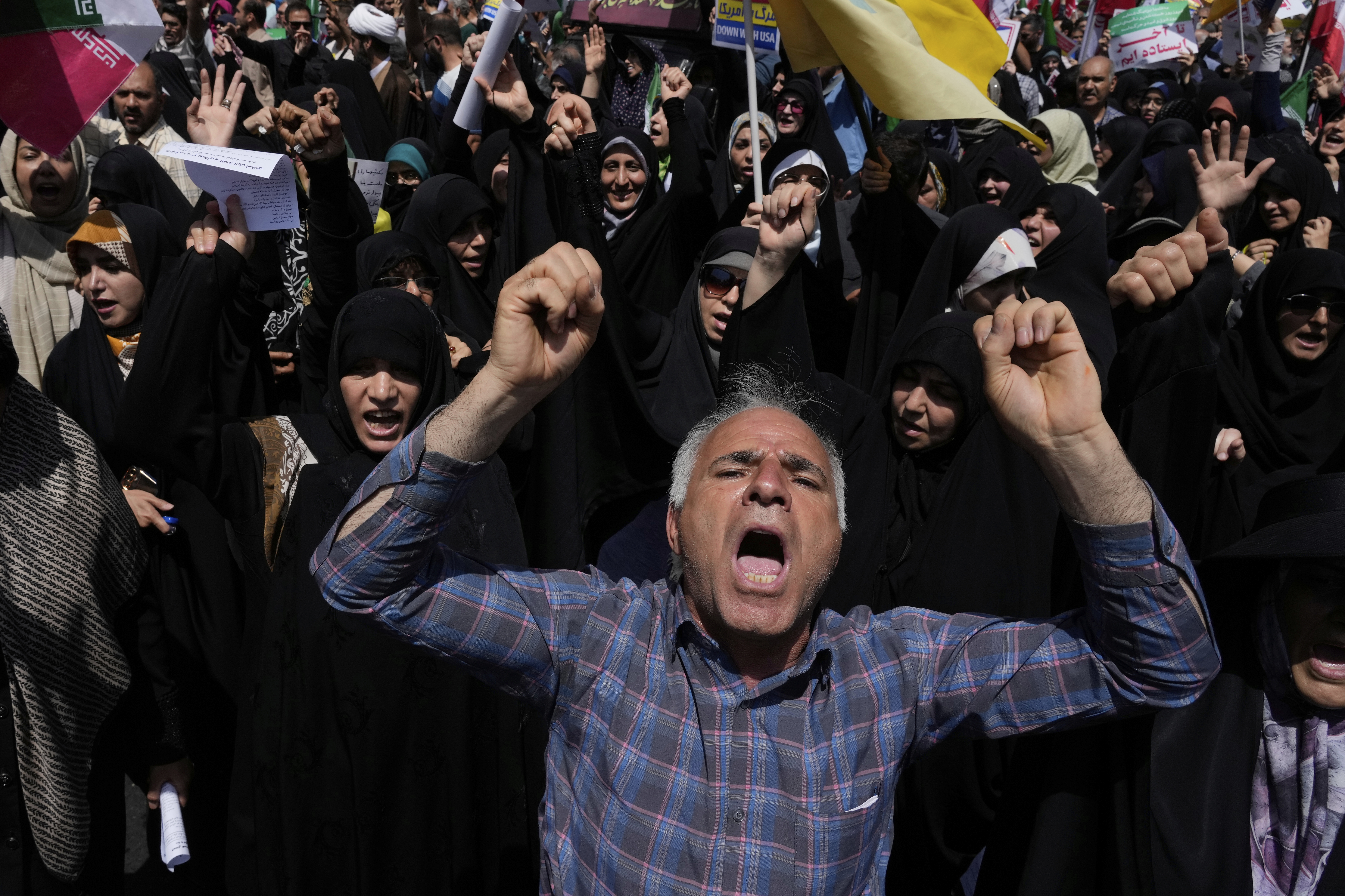 People chant slogans during a protest to condemn Israeli attacks on multiple cities across Iran, after the Friday prayers ceremony in Tehran, Iran, Friday, June 20, 2025. (AP Photo/Vahid Salemi)
