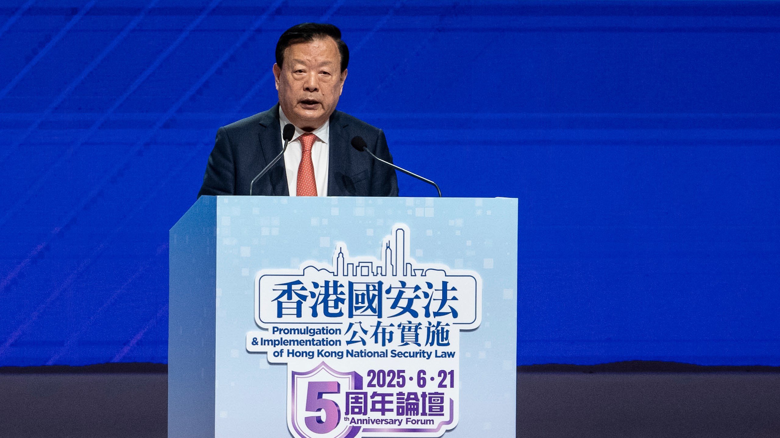 Xia Baolong, director of Hong Kong & Macao Affairs Office, speaks at the 5th anniversary of Hong Kong National Security Law Forum in Hong Kong, Saturday, June 21, 2025. (AP Photo/Chan Long Hei)