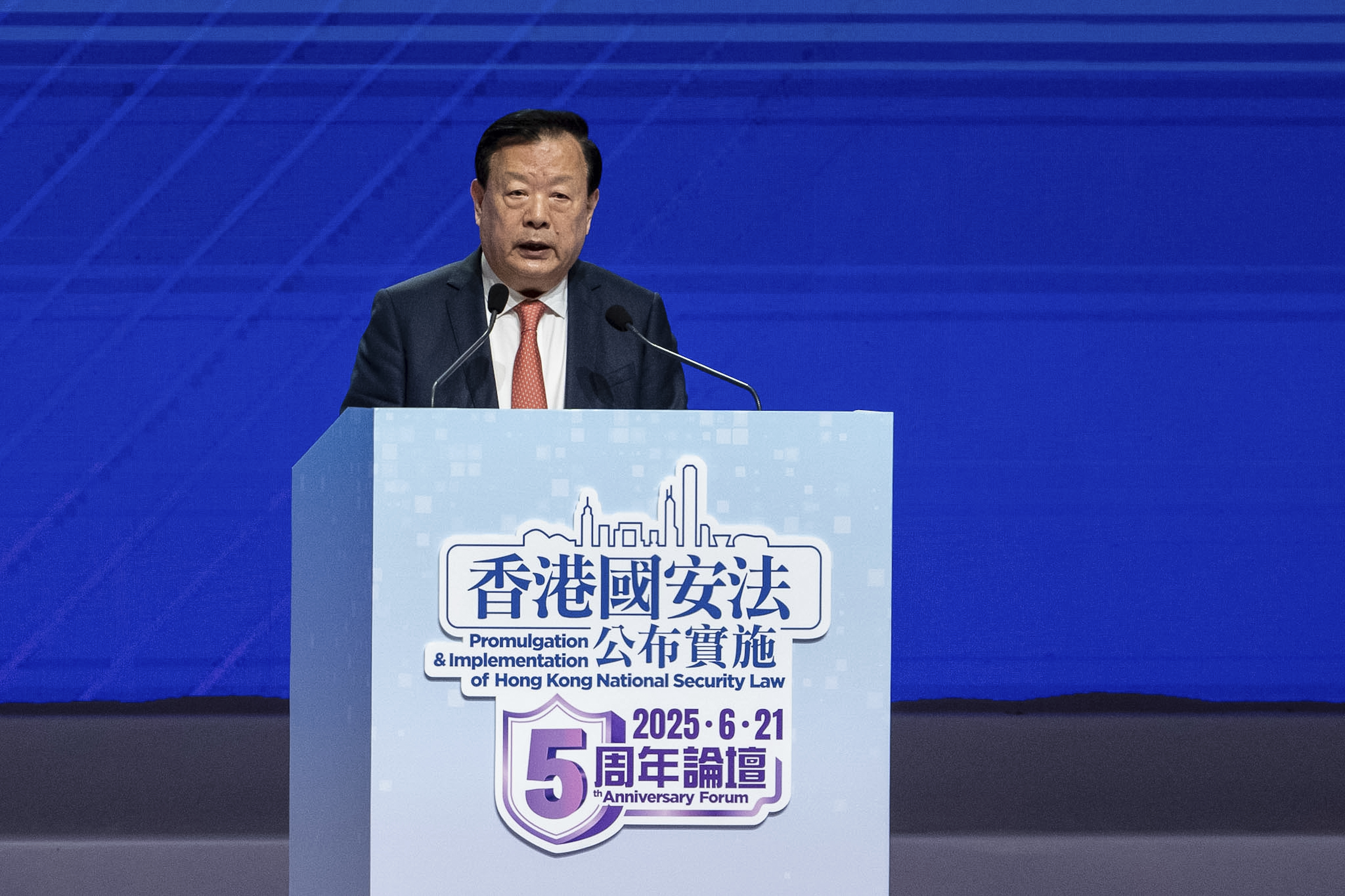 Xia Baolong, director of Hong Kong & Macao Affairs Office, speaks at the 5th anniversary of Hong Kong National Security Law Forum in Hong Kong, Saturday, June 21, 2025. (AP Photo/Chan Long Hei)