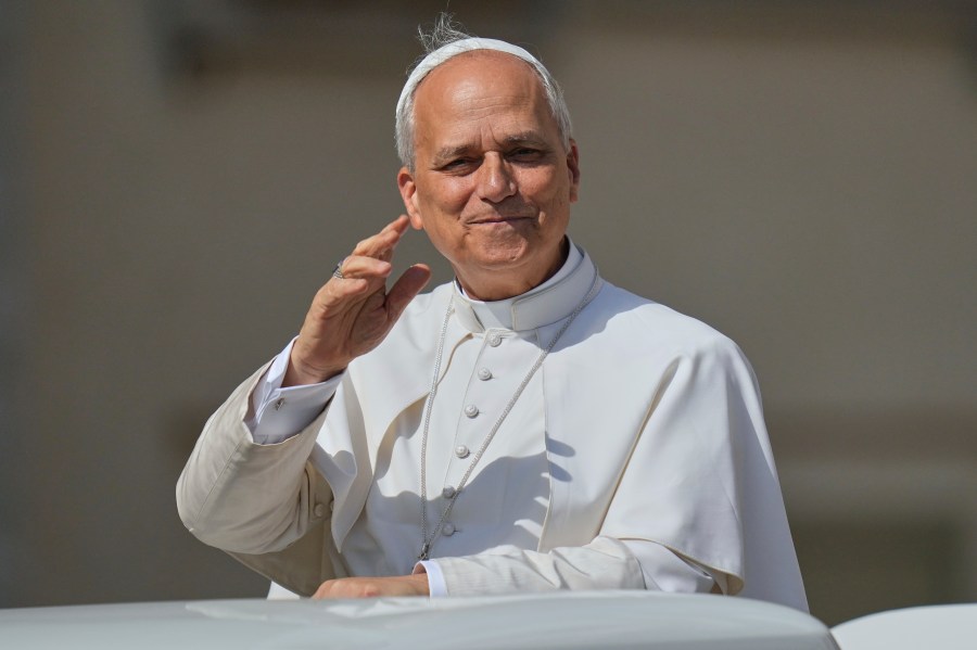 Pope Leo XIV arrives for his weekly general audience in St. Peter's Square at the Vatican, Wednesday, June 18, 2025. (AP Photo/Alessandra Tarantino)