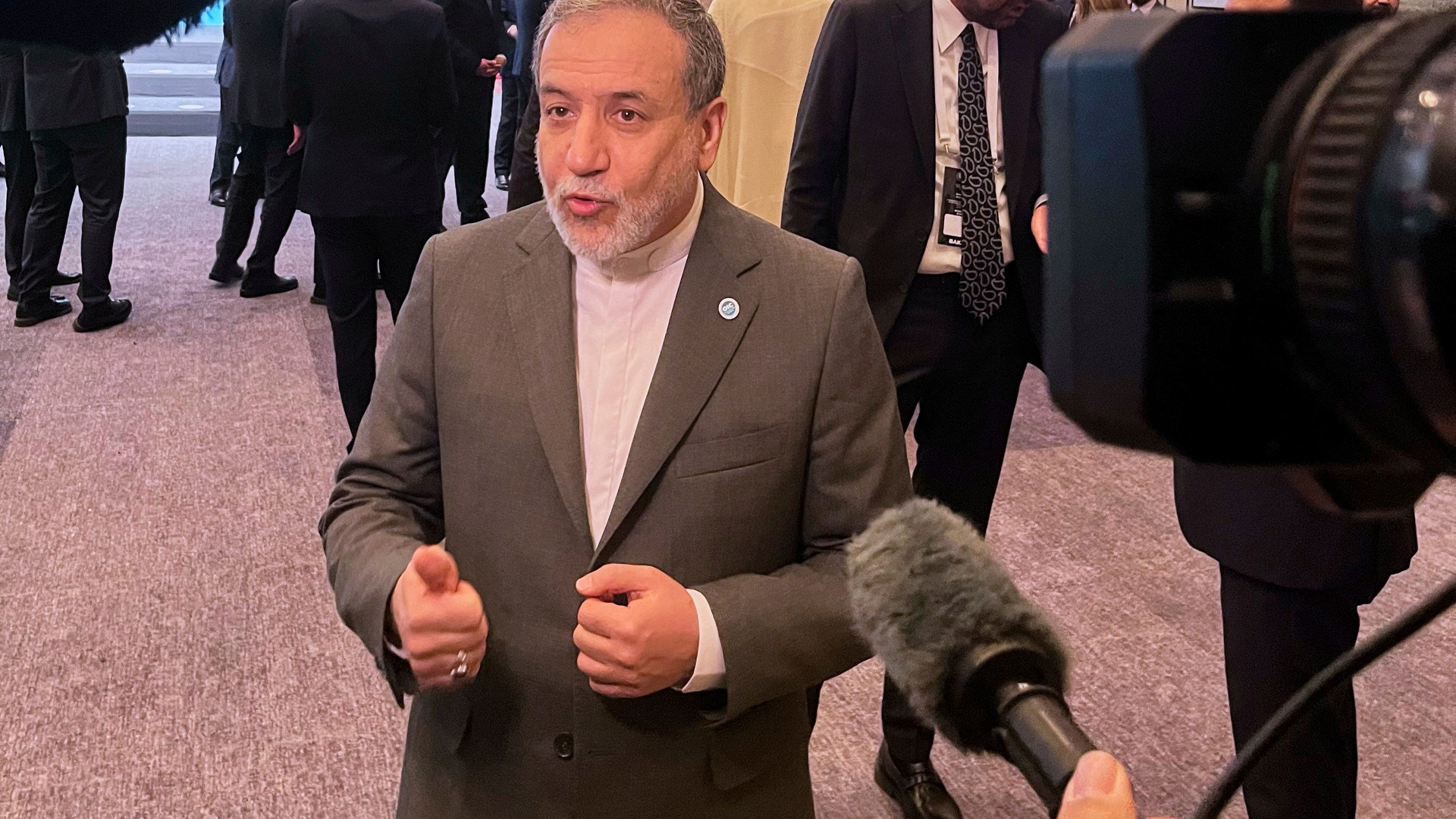 Iranian Foreign Minister Abbas Araghchi speaks to the media as he arrives to the Council of Foreign Ministers of the Organization of Islamic Cooperation meeting, in Istanbul, Turkey, Saturday, June 21, 2025. (AP Photo/Mehmet Guzel)