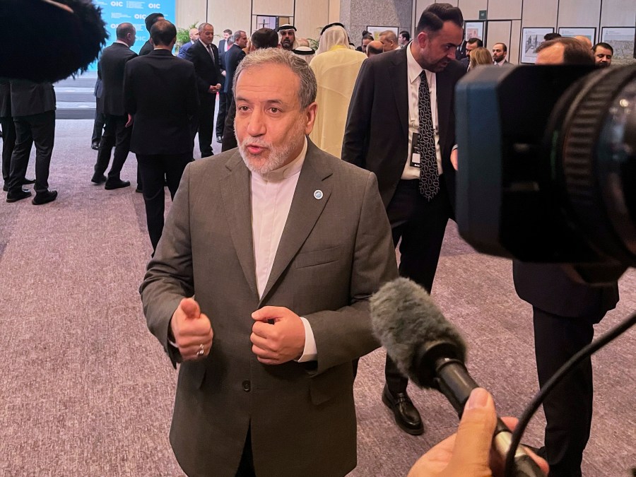 Iranian Foreign Minister Abbas Araghchi speaks to the media as he arrives to the Council of Foreign Ministers of the Organization of Islamic Cooperation meeting, in Istanbul, Turkey, Saturday, June 21, 2025. (AP Photo/Mehmet Guzel)